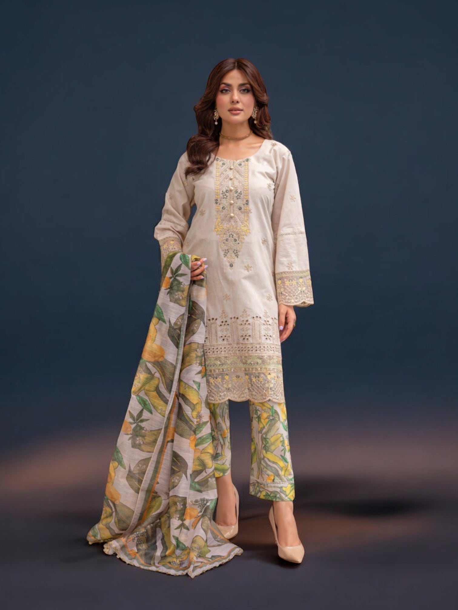 Pakistani Salwar Kameez suit by Saree Ghor Charlotte featuring traditional ethnic wear for women with intricate designs and vibrant colors.