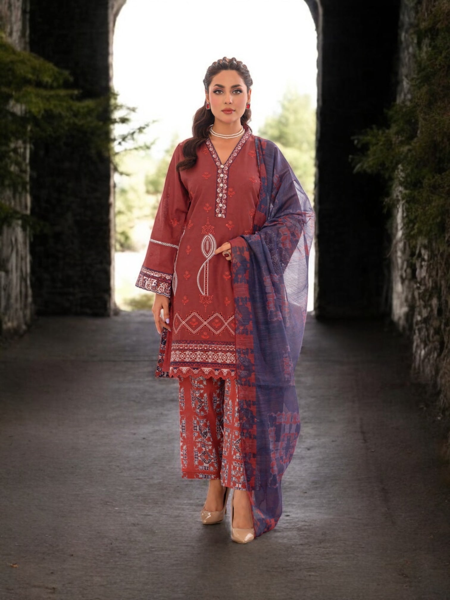 Pakistani Salwar Kameez suit by Saree Ghor Charlotte, traditional ethnic wear for women featuring vibrant fabric and intricate design.