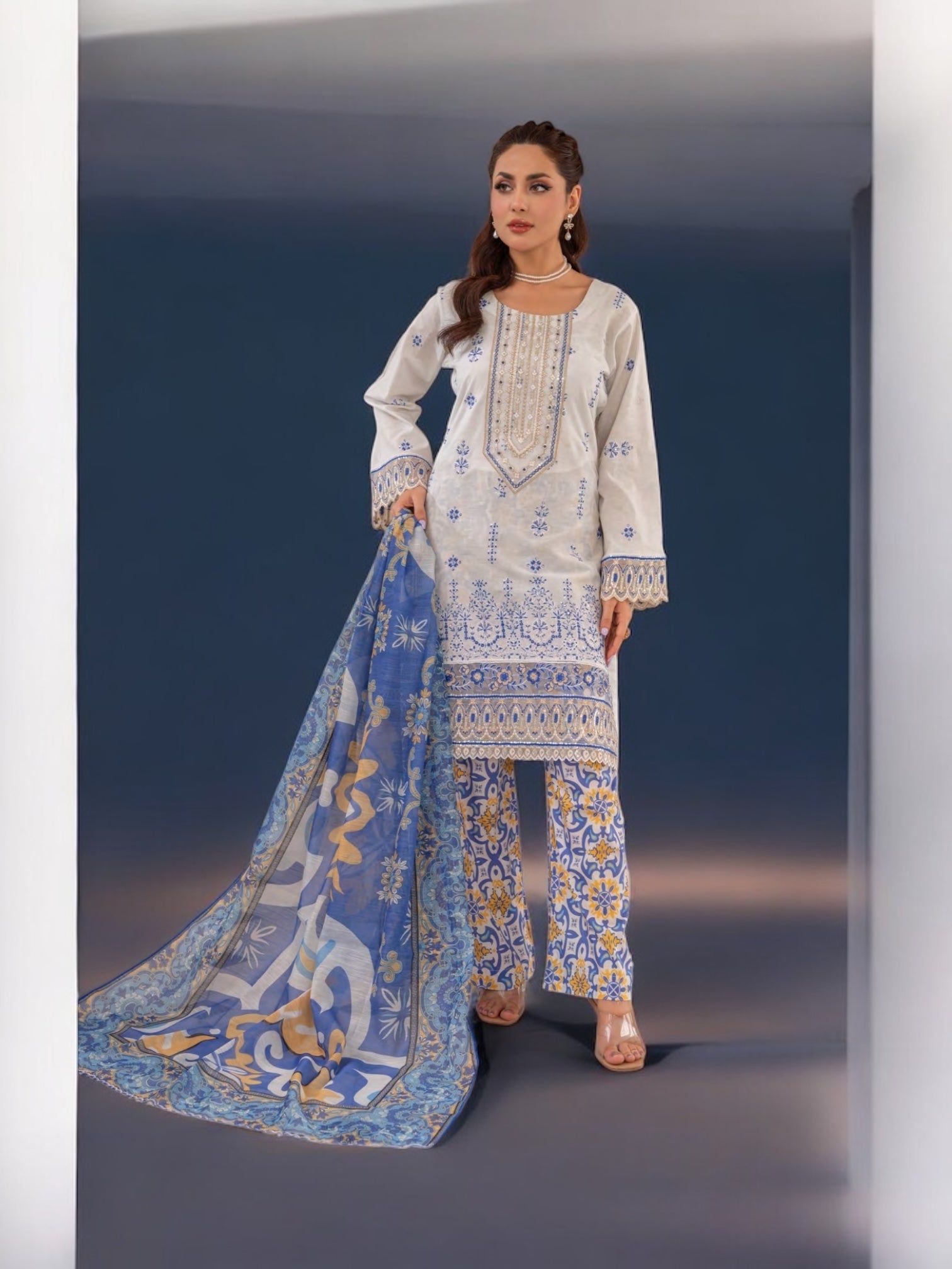 Pakistani Salwar Kameez suit by Saree Ghor Charlotte, ethnic cultural wear for women with vibrant traditional embroidery.