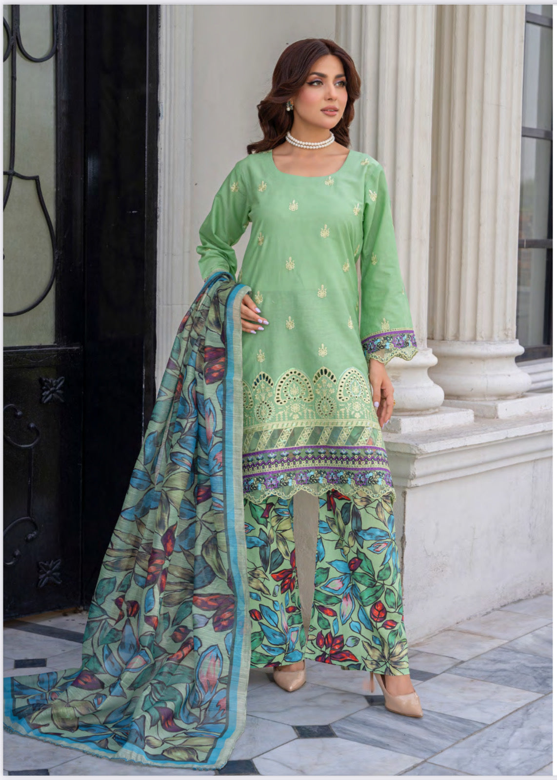 Pakistani Salwar Kameez Suit by Saree Ghor Charlotte, vibrant ethnic wear for women featuring traditional design and colorful fabric.