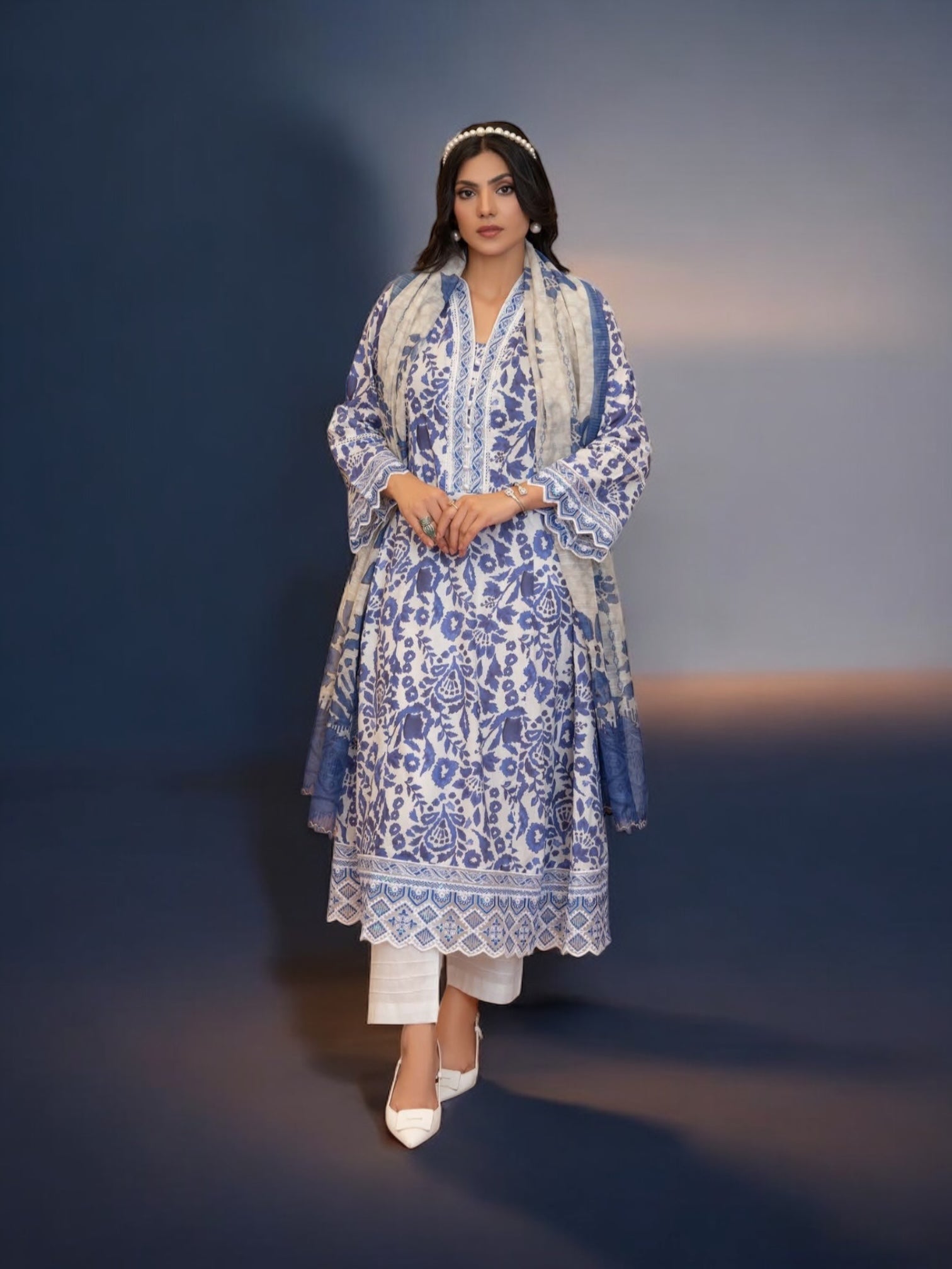 Pakistani Salwar Kameez suit by Saree Ghor Charlotte featuring vibrant ethnic wear for women with traditional embroidery and colorful fabric.