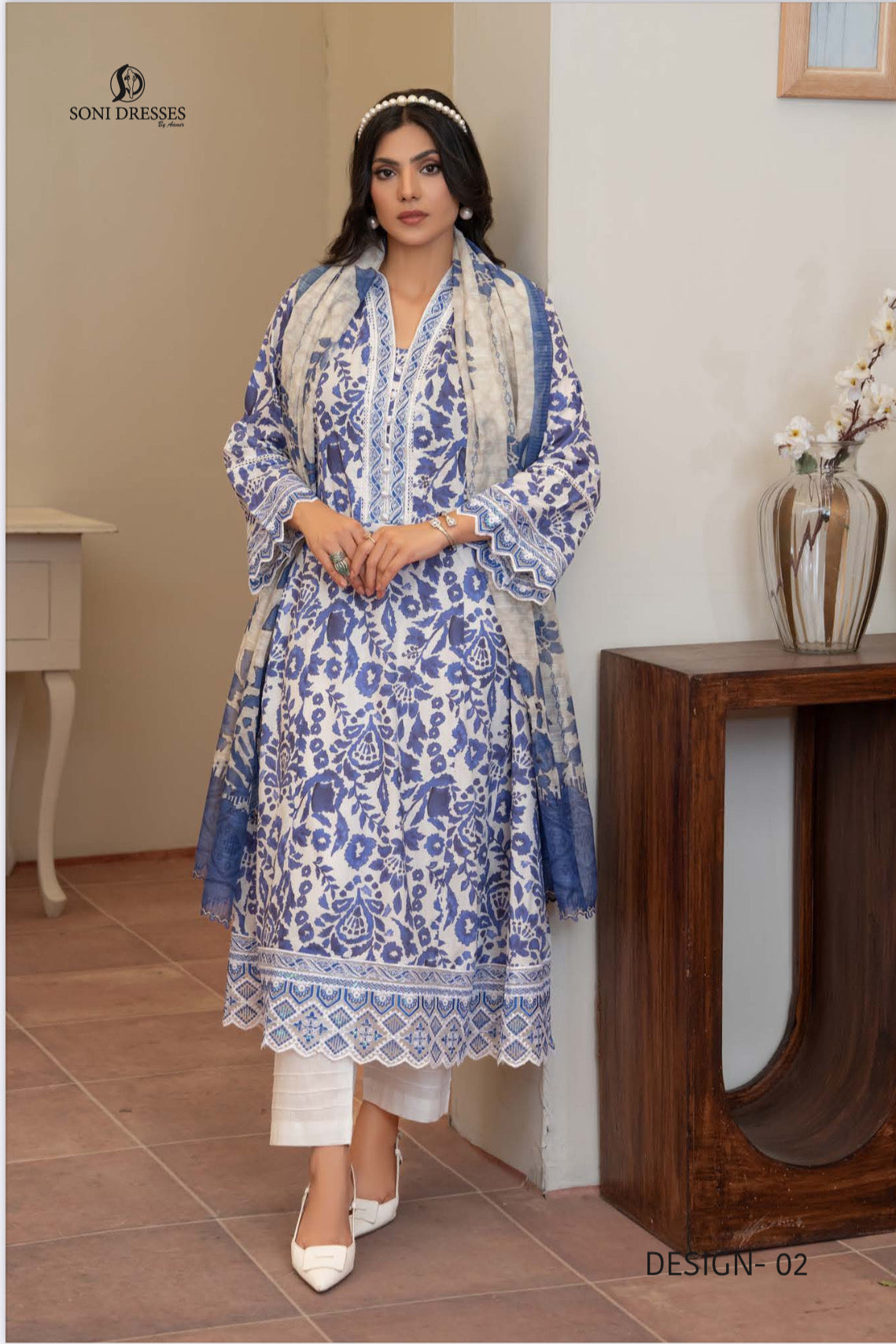 Pakistani Salwar Kameez suit by Saree Ghor Charlotte, traditional ethnic wear for women with intricate design and vibrant colors.