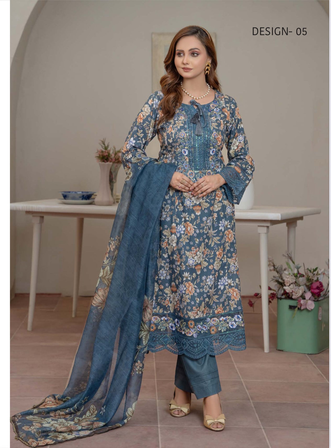 Pakistani Salwar Kameez suit by Saree Ghor Charlotte, featuring traditional ethnic wear for women with vibrant fabric and intricate design.