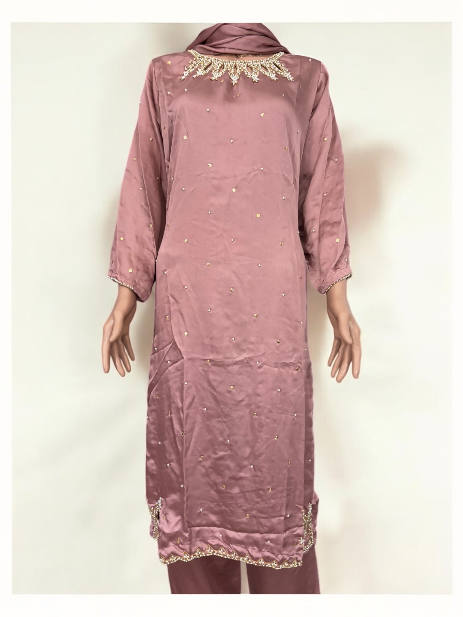 Pink traditional designer Salwar Kameez suit for women by Saree Ghor Charlotte, featuring intricate ethnic embroidery.