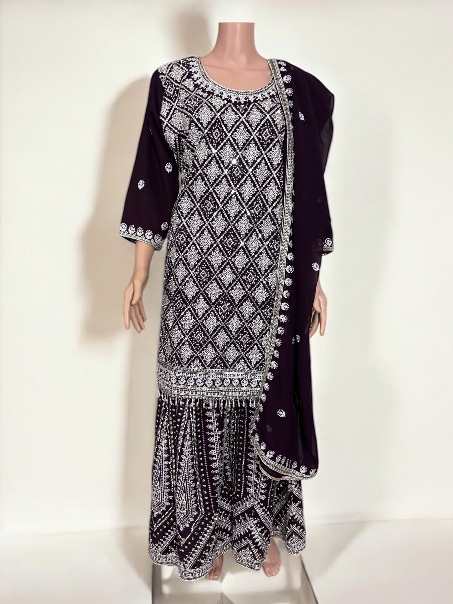 Purple traditional designer Salwar Kameez suit by Saree Ghor Charlotte, featuring ethnic embroidery and elegant cultural wear for women.