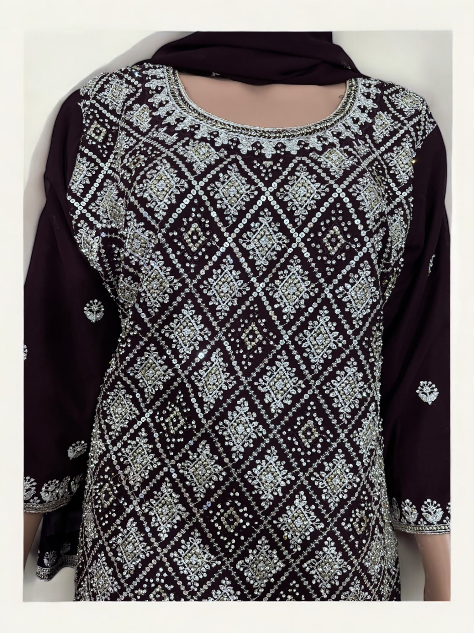 Purple traditional designer Salwar Kameez suit for women by Saree Ghor Charlotte, showcasing intricate ethnic wear details.