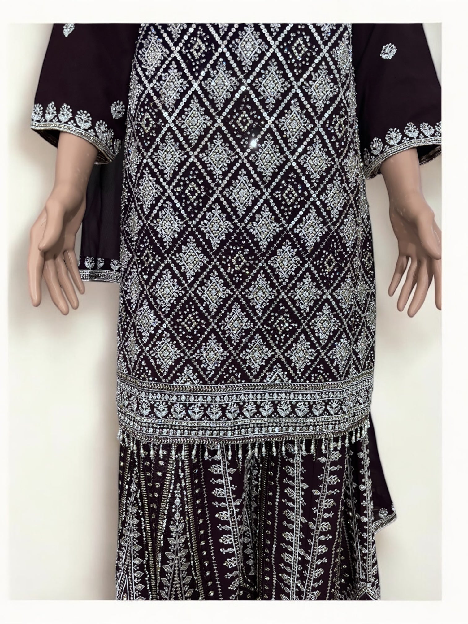 Purple traditional designer Salwar Kameez suit by Saree Ghor Charlotte, ethnic wear for women with intricate patterns and vibrant fabric.