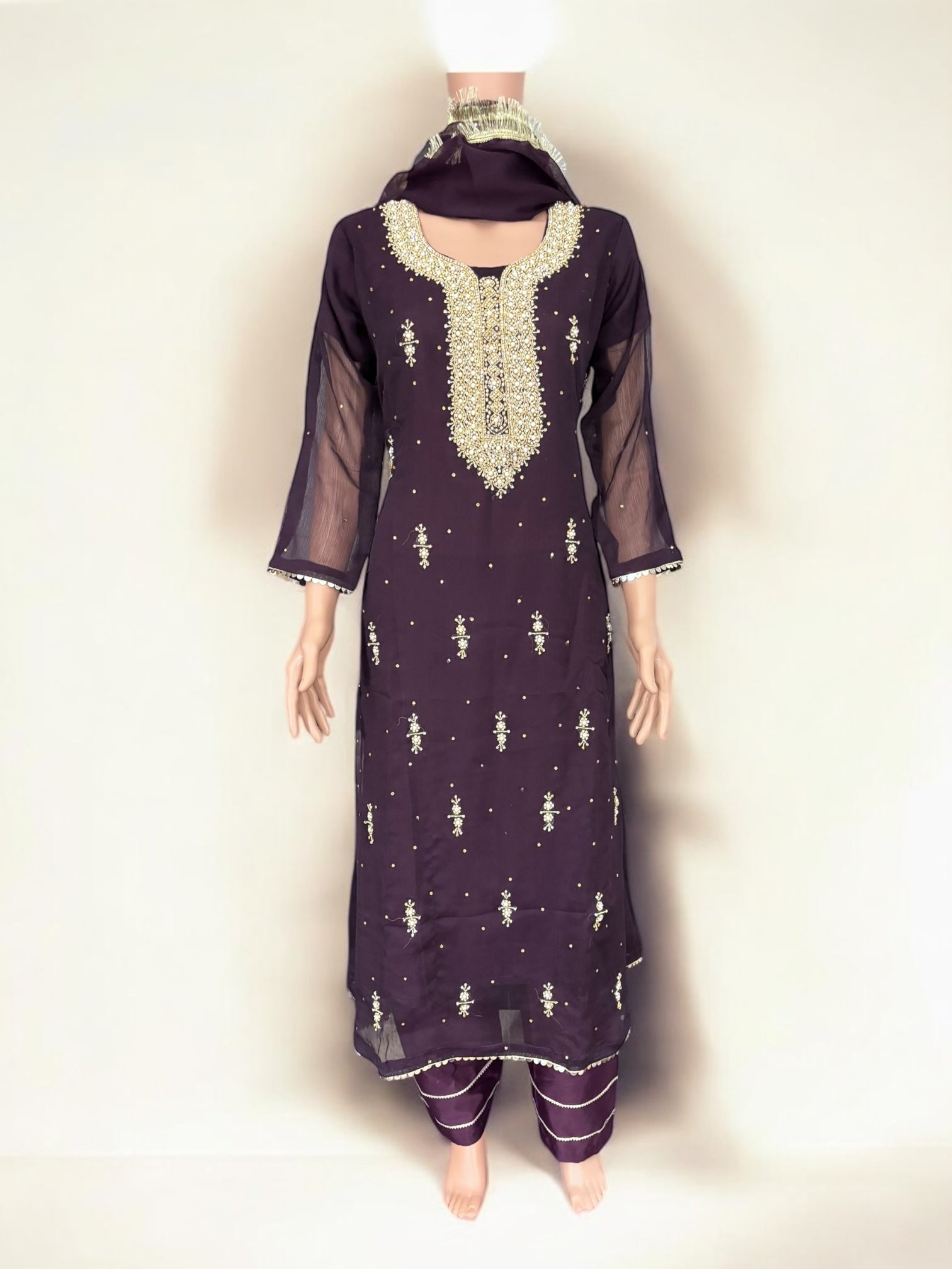Purple traditional designer Salwar Kameez suit by Saree Ghor Charlotte, featuring intricate ethnic embroidery and elegant cultural wear for women.