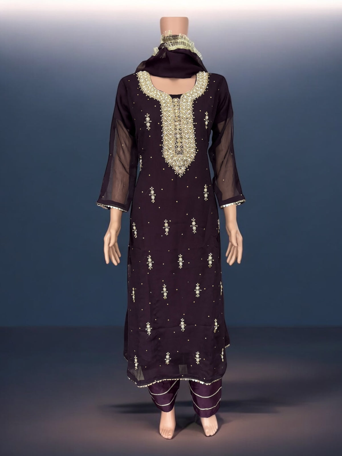 Purple traditional designer Salwar Kameez suit for women by Saree Ghor Charlotte, showcasing ethnic wear with intricate patterns.