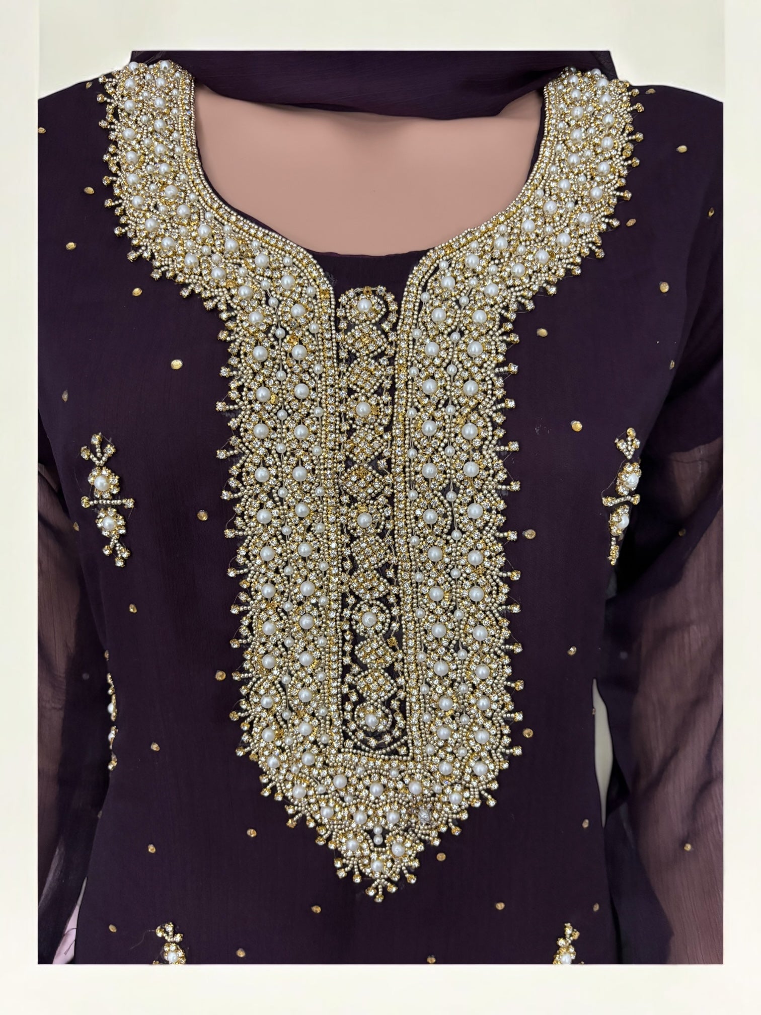 Purple traditional designer Salwar Kameez suit by Saree Ghor Charlotte, featuring elegant ethnic wear with intricate detailing.