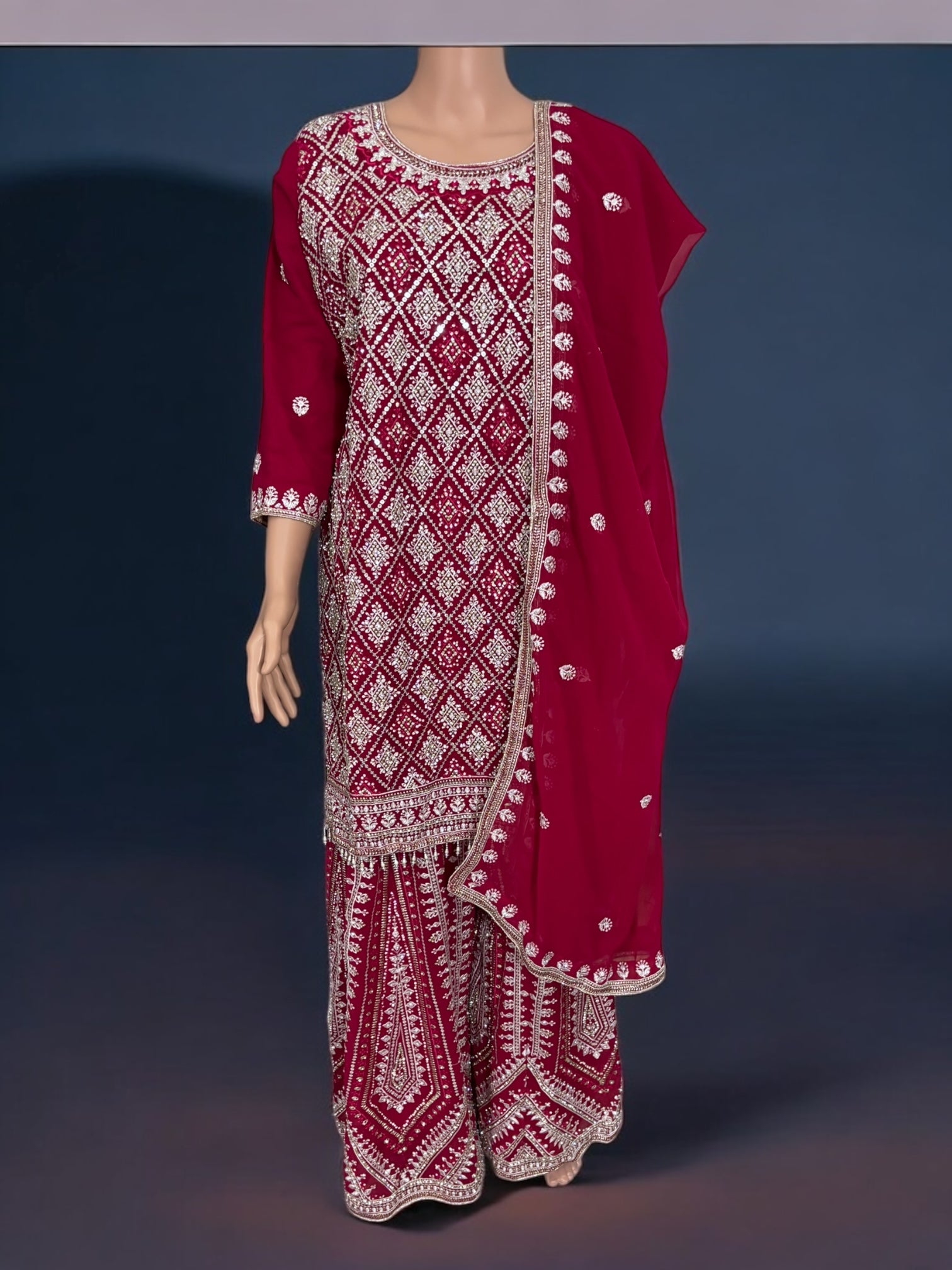 Rani Pink traditional designer Salwar Kameez suit by Saree Ghor Charlotte, with intricate embroidery and ethnic wear style for women.