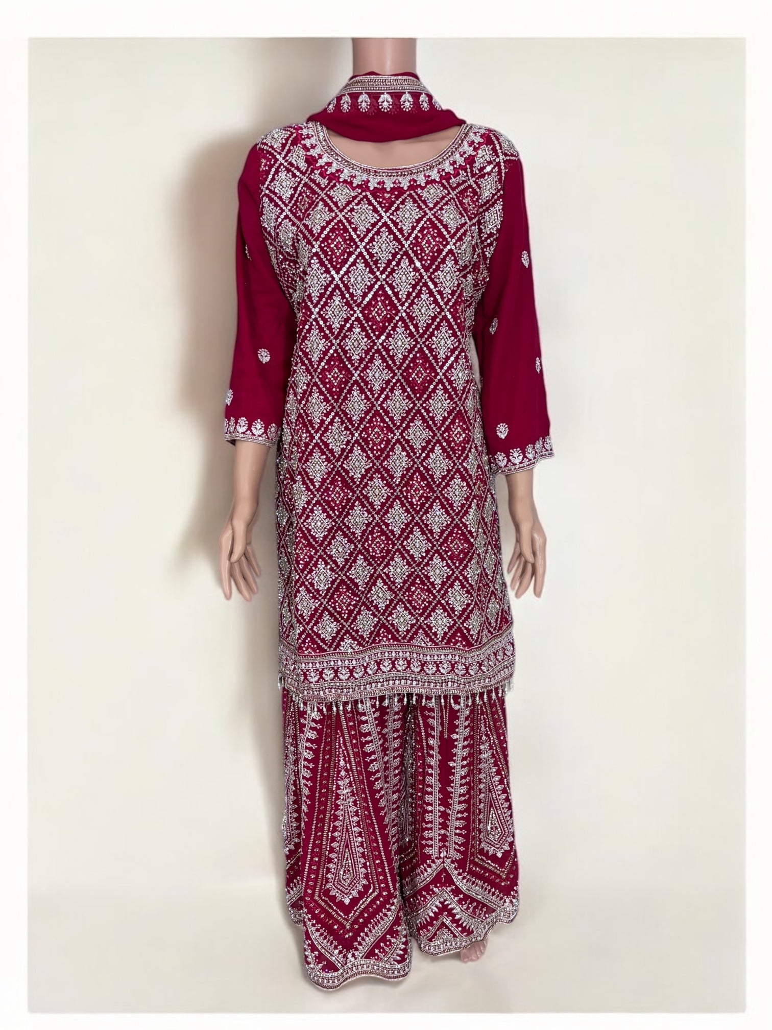 Rani Pink traditional designer salwar kameez suit for women, showcasing intricate embroidery and elegant ethnic wear by Saree Ghor Charlotte.