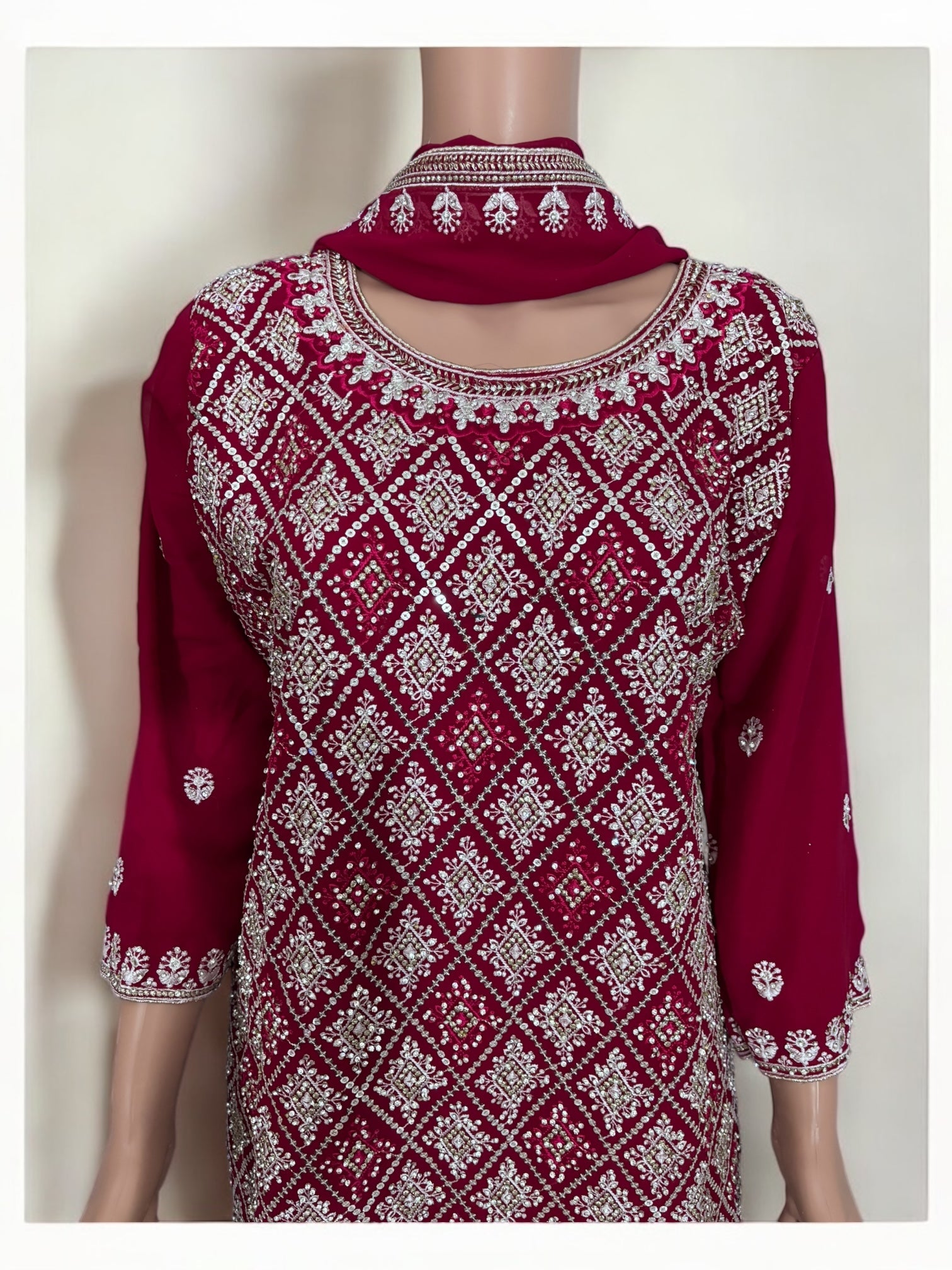 Rani Pink traditional designer Salwar Kameez suit for women with intricate embroidery, by Saree Ghor Charlotte.