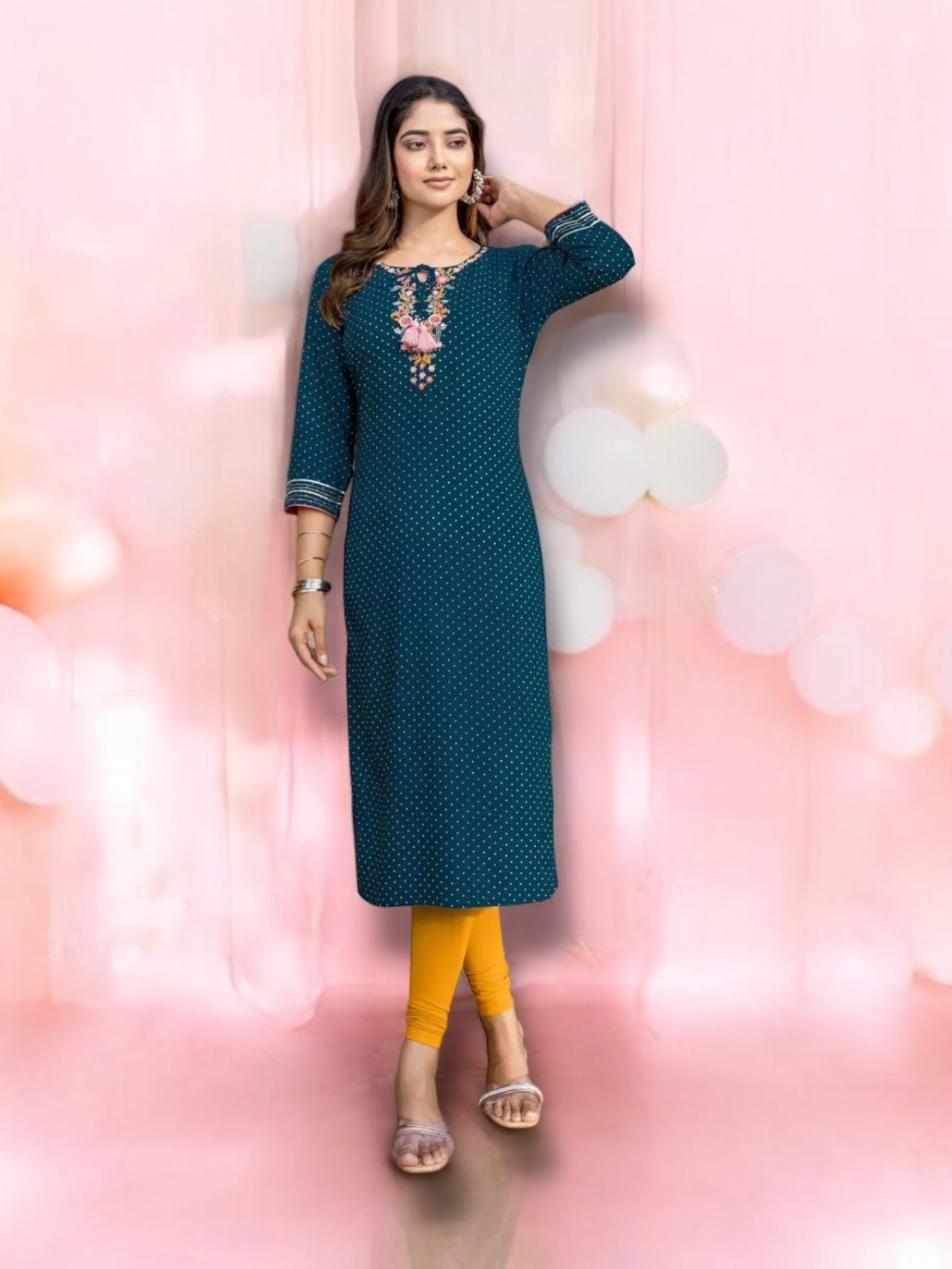 Rayon printed designer kurti from Saree Ghor Charlotte, soft fabric ethnic wear for women, styled as a traditional salwar kameez.