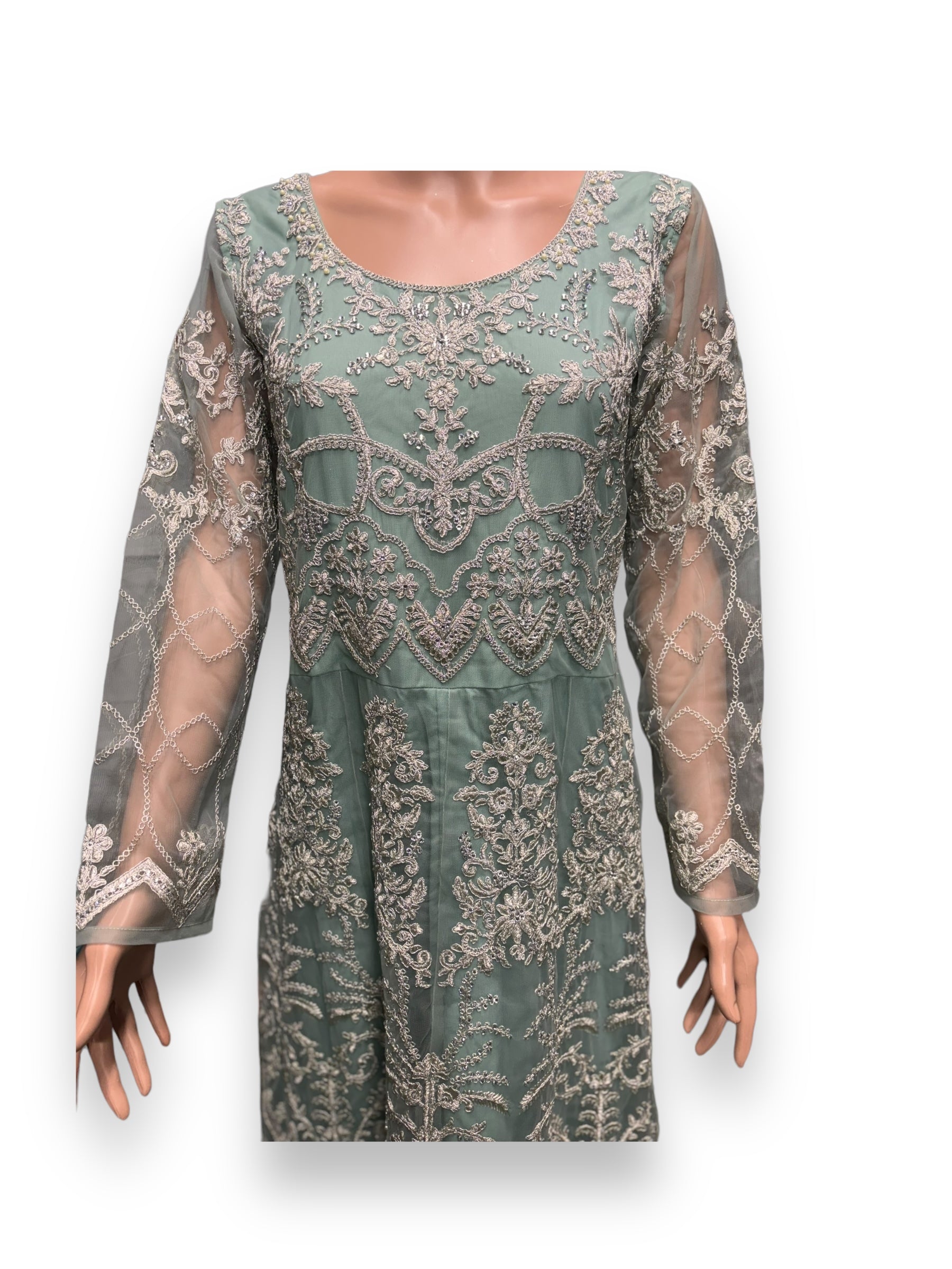 Sea green bridal Anarkali gown by Saree Ghor Charlotte, elegant cultural wear for women featuring intricate embroidery and flowing fabric.