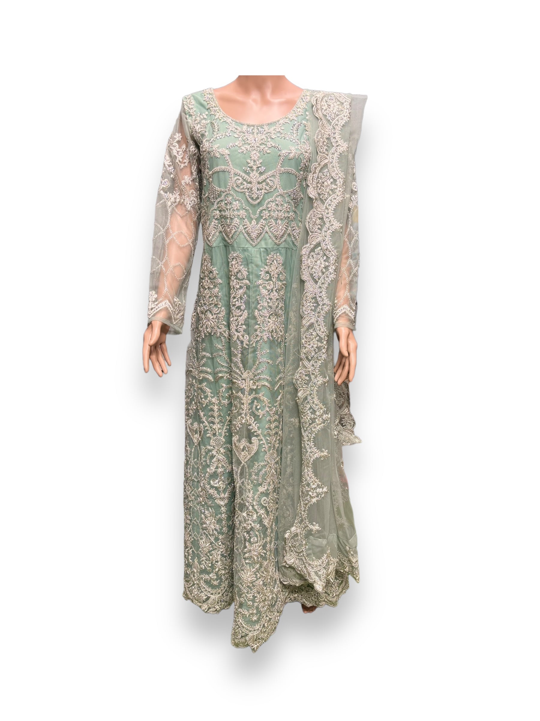 Sea green bridal Anarkali gown by Saree Ghor Charlotte, elegant ethnic wear for women, detailed embroidery and flowing fabric.