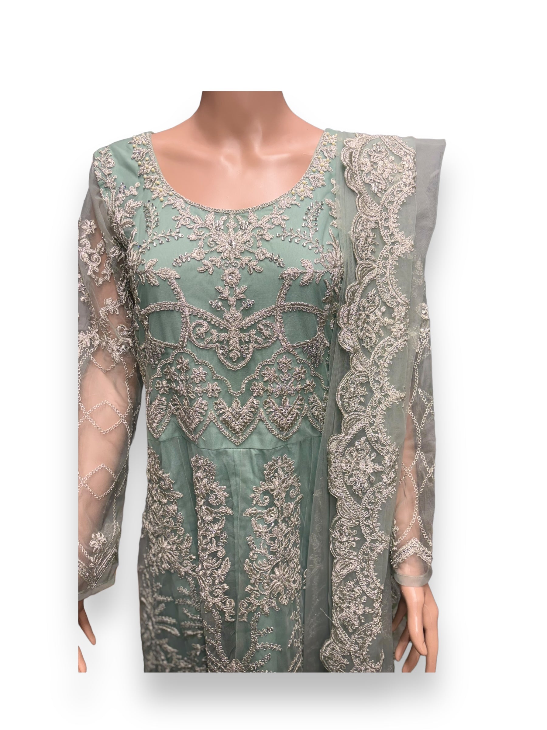 Sea green bridal Anarkali gown by Saree Ghor Charlotte, showcasing intricate embroidery and traditional ethnic wear for women.