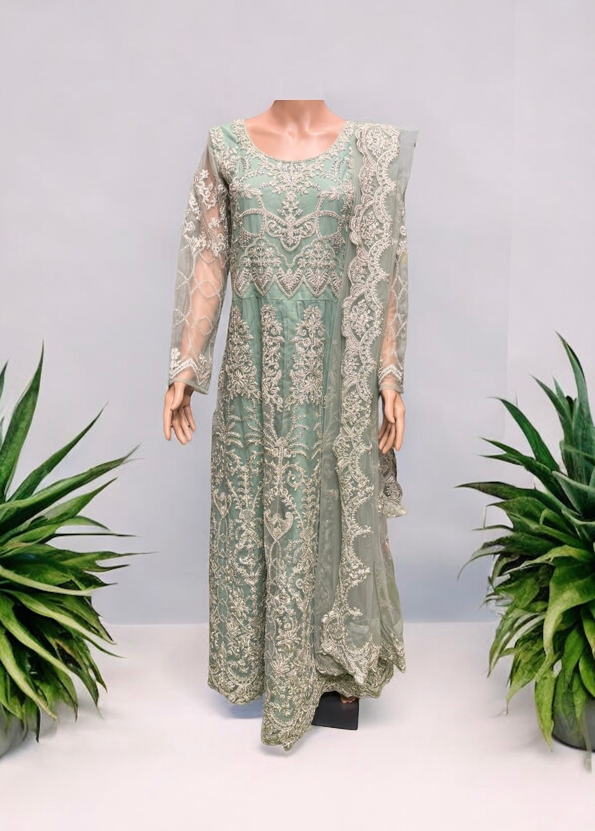 Sea green bridal Anarkali gown by Saree Ghor Charlotte, elegant ethnic Salwar Kameez for women with intricate embroidery.