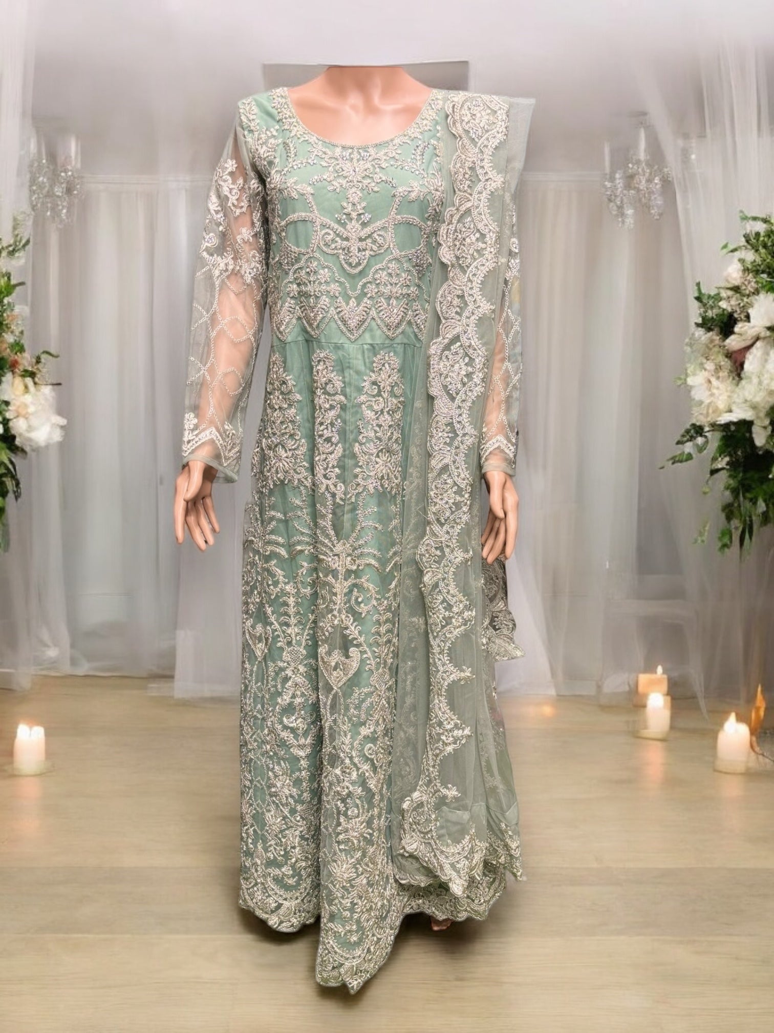 Sea green bridal Anarkali gown by Saree Ghor Charlotte, elegant ethnic Salwar Kameez for women with intricate embroidery and flowing fabric.