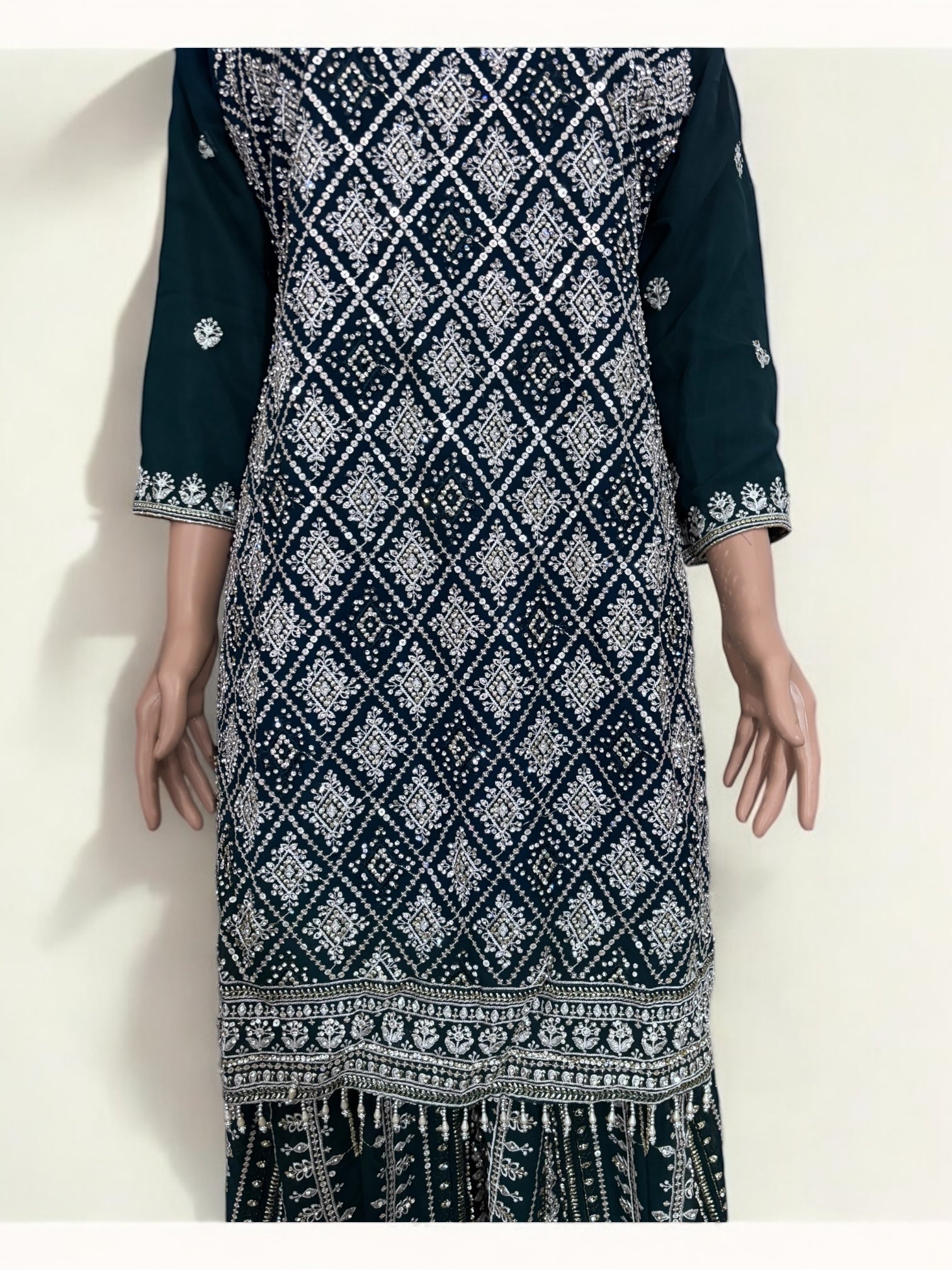 Teal green traditional designer Salwar Kameez suit for women by Saree Ghor Charlotte, featuring intricate ethnic embroidery.
