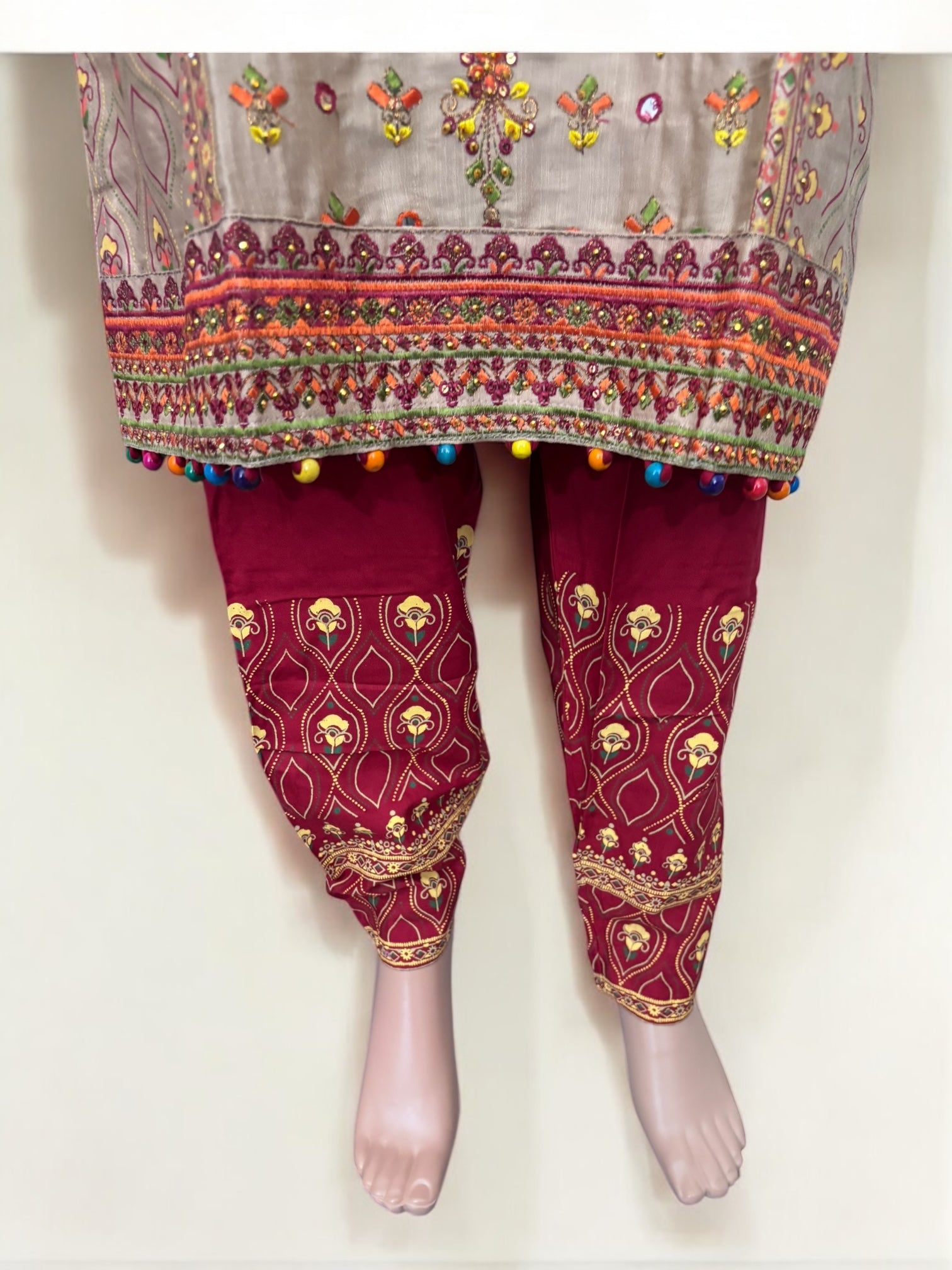 Traditional cotton Salwar Kameez suit for women by Saree Ghor Charlotte, featuring intricate ethnic design and vibrant colors.