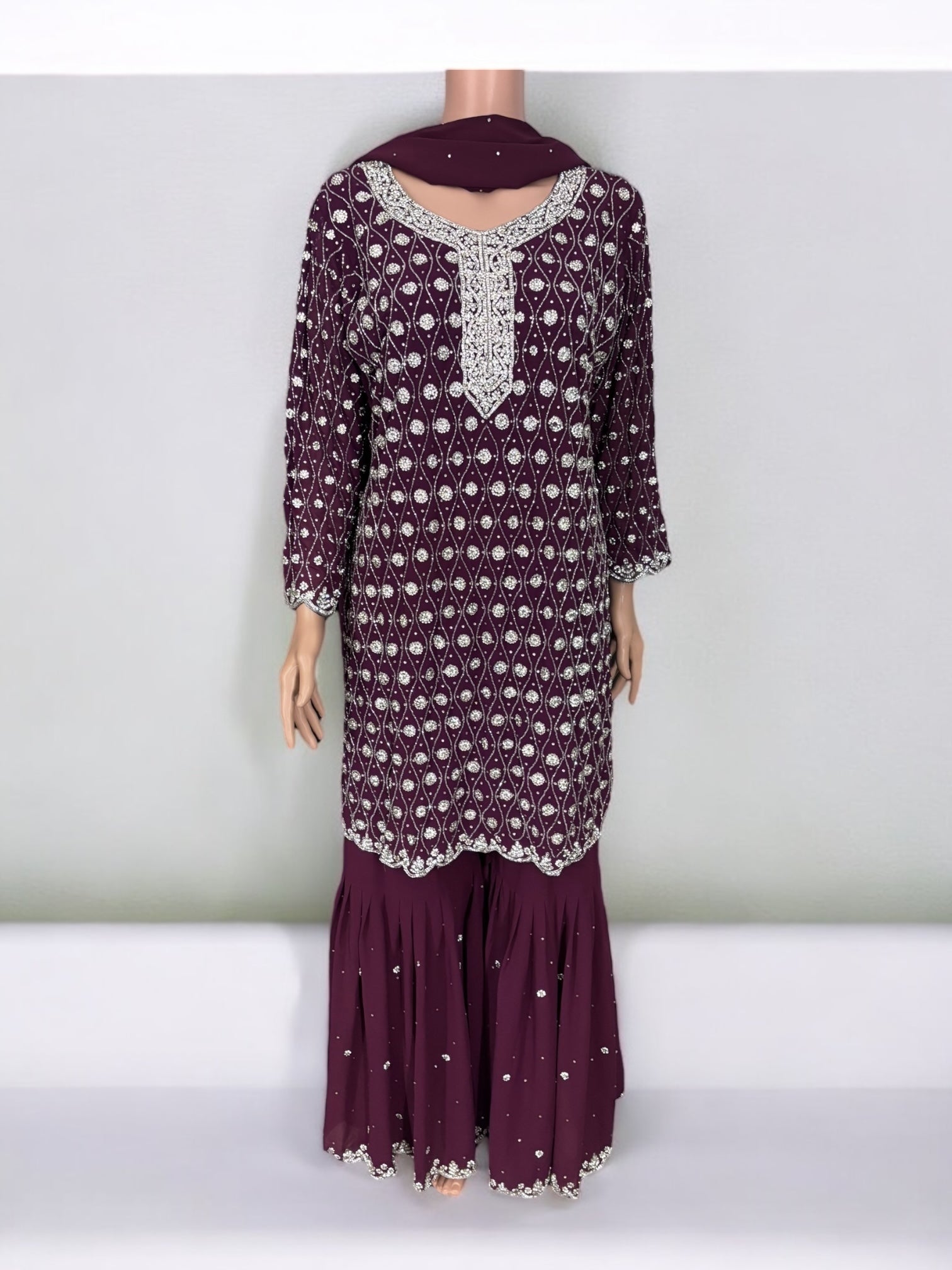 Traditional designer Garara Salwar Kameez suit by Saree Ghor Charlotte, ethnic wear with intricate embroidery and vibrant colors.