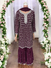 Traditional designer Garara Salwar Kameez suit by Saree Ghor Charlotte, featuring intricate ethnic embroidery and vibrant colors.