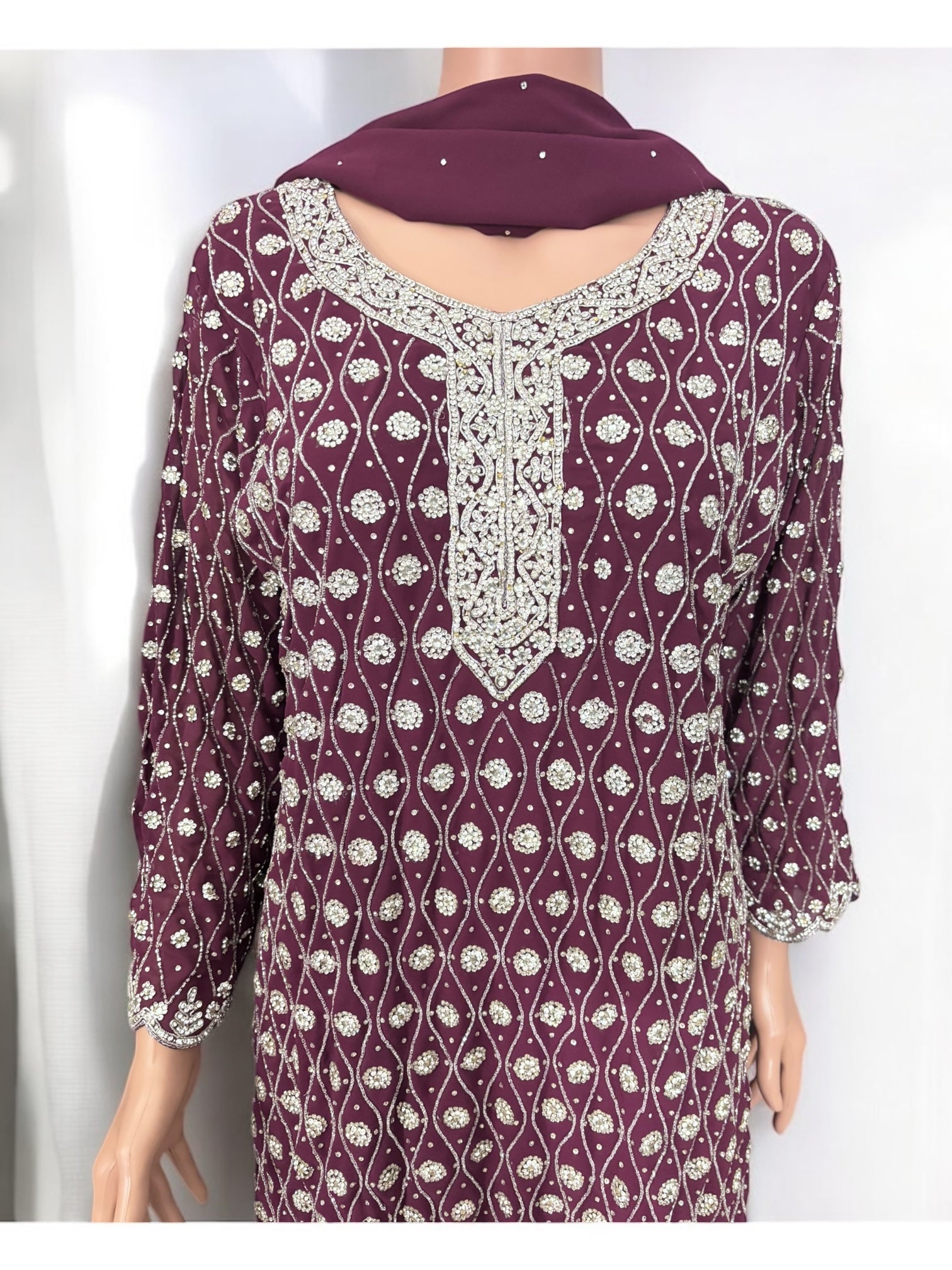 Traditional designer Garara Salwar Kameez suit by Saree Ghor Charlotte, showcasing intricate ethnic wear with vibrant colors and detailed embroidery.