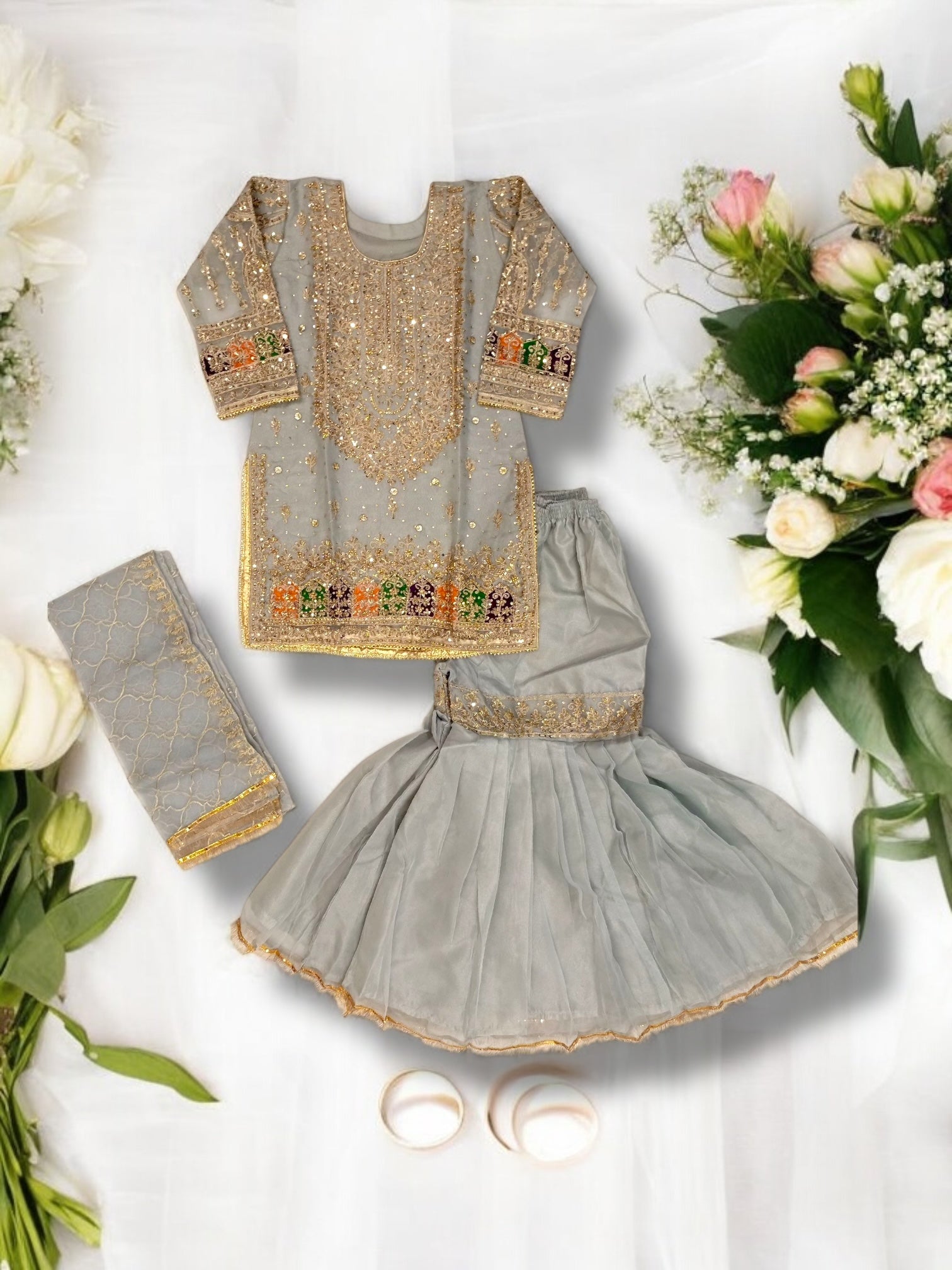 Traditional designer Gharara Salwar Kameez set by Saree Ghor Charlotte, featuring intricate embroidery and vibrant ethnic wear for women.