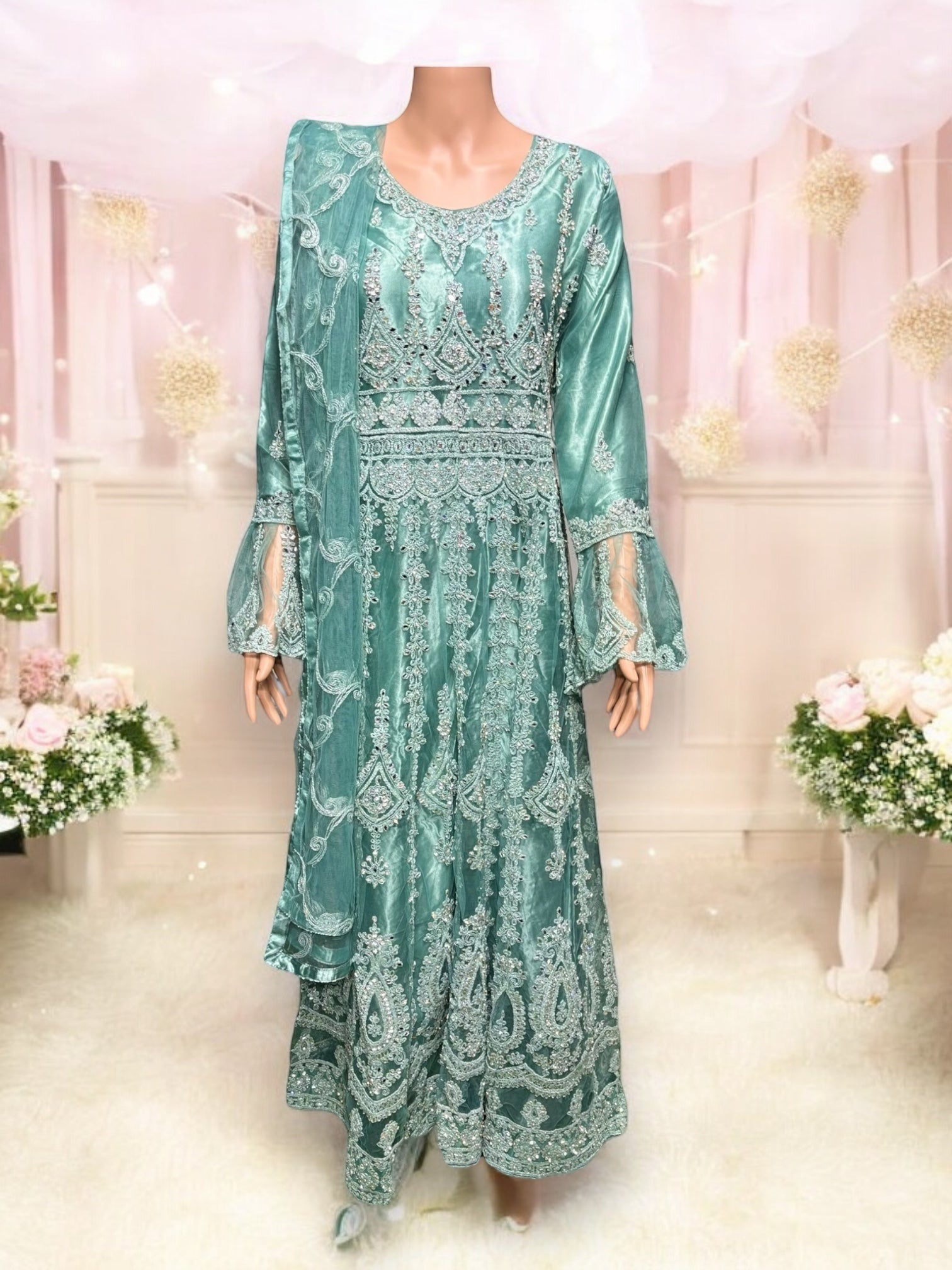 Traditional designer maxi gown by Saree Ghor Charlotte, ethnic salwar kameez for women with intricate patterns and vibrant colors.