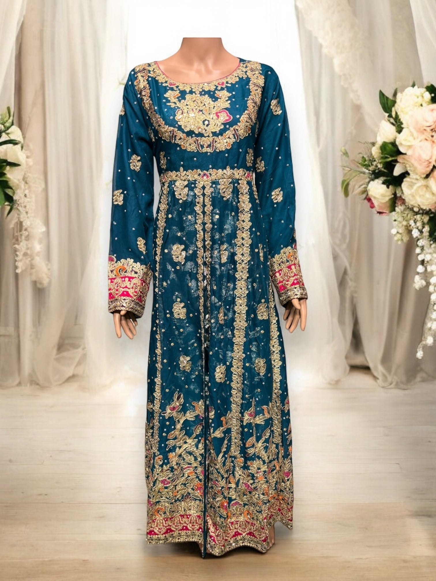 Traditional designer maxi gown for women, Saree Ghor Charlotte salwar kameez with intricate ethnic embroidery and vibrant fabric.