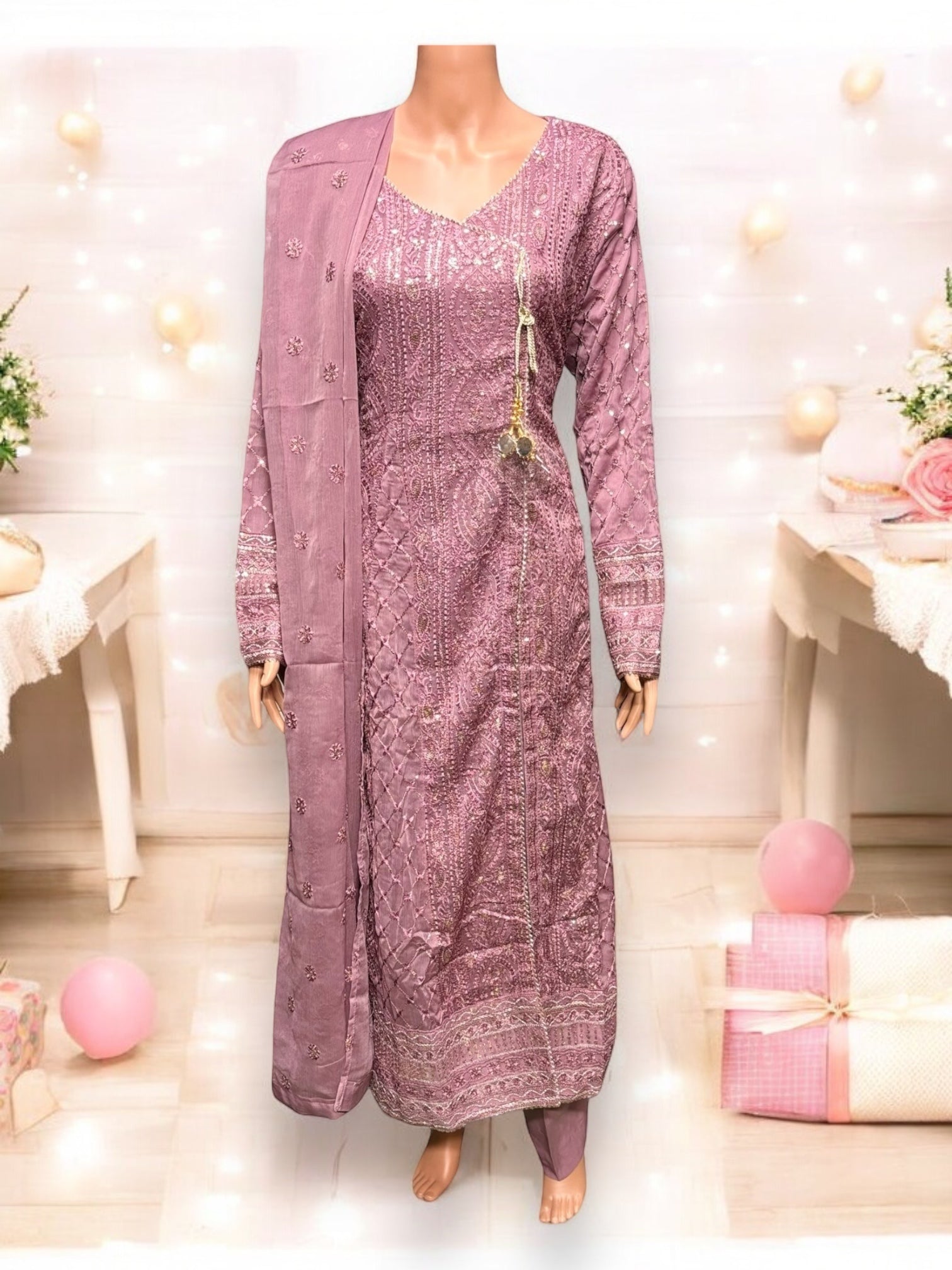 Traditional designer Salwar Kameez set by Saree Ghor Charlotte, featuring vibrant ethnic wear for women with intricate details.