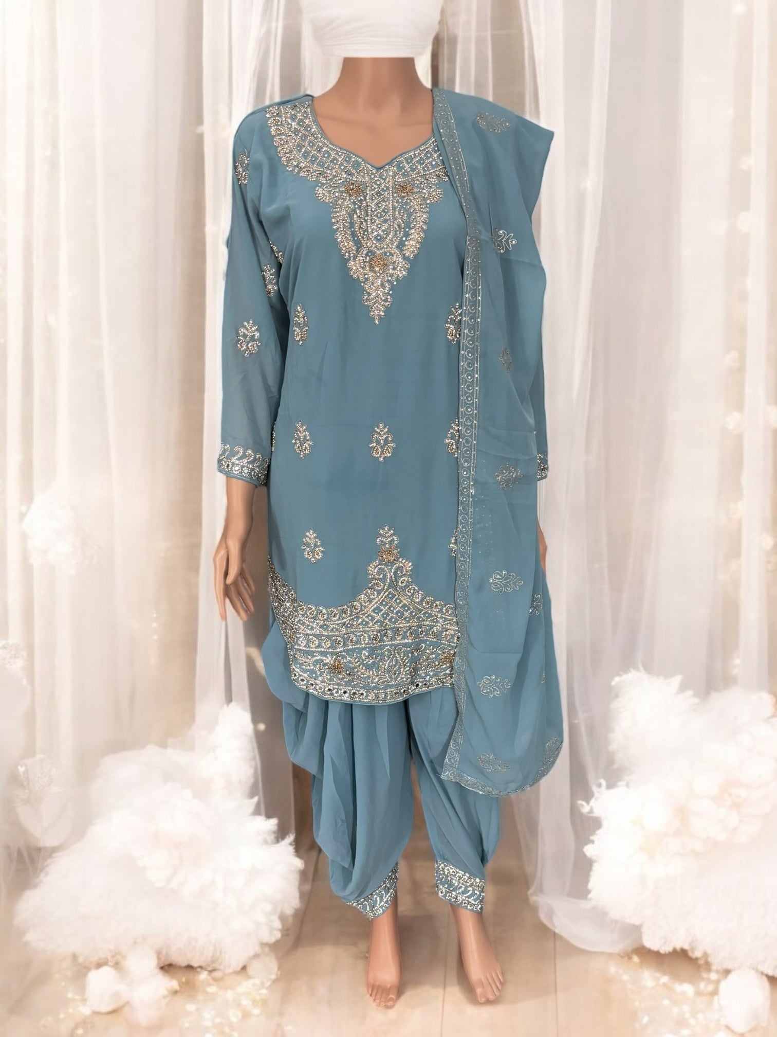Traditional designer Patiala Dhuti Salwar Kameez suit by Saree Ghor Charlotte, ethnic wear for women, detailed fabric and vibrant colors.