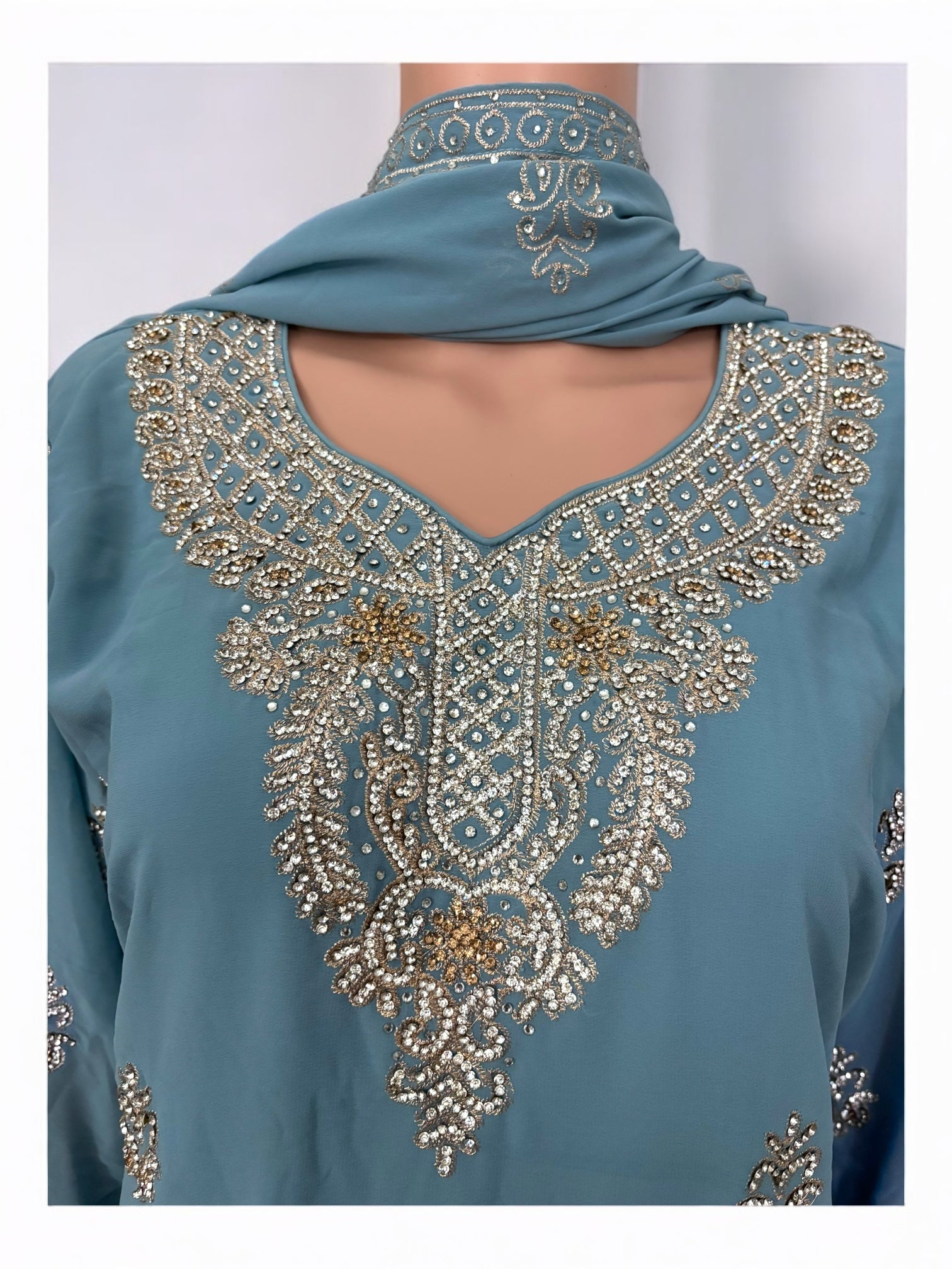 Traditional designer Patiala Dhuti Salwar Kameez suit by Saree Ghor Charlotte, showcasing vibrant ethnic wear for women.