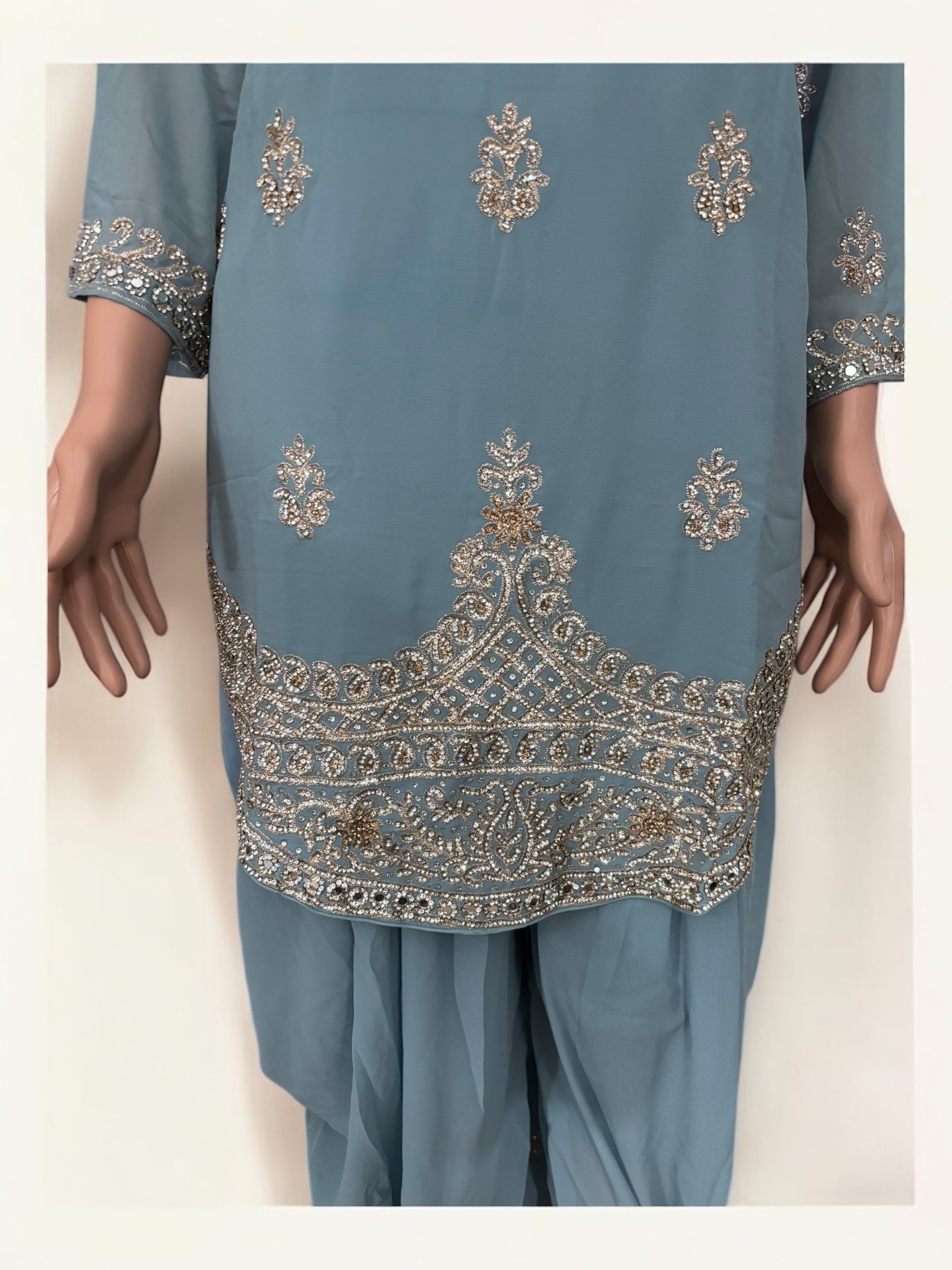 Traditional designer Patiala Dhuti Salwar Kameez suit by Saree Ghor Charlotte, featuring vibrant ethnic wear for women.