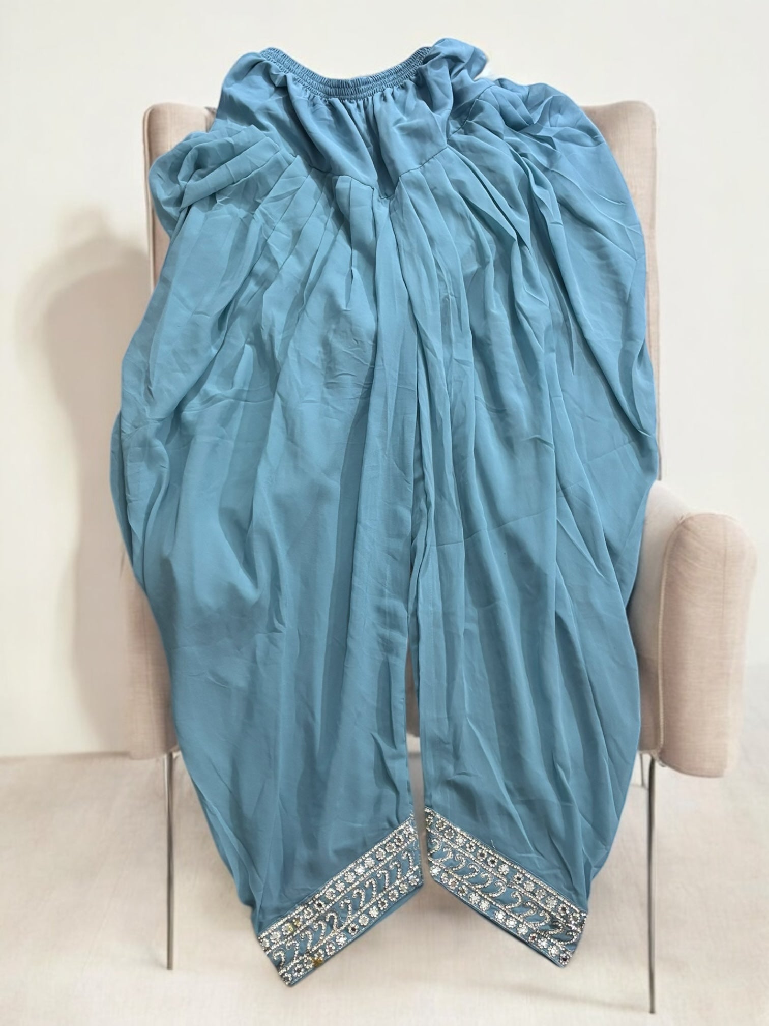 Traditional designer Patiala Dhuti Salwar Kameez suit by Saree Ghor Charlotte, featuring intricate ethnic patterns and vibrant colors.