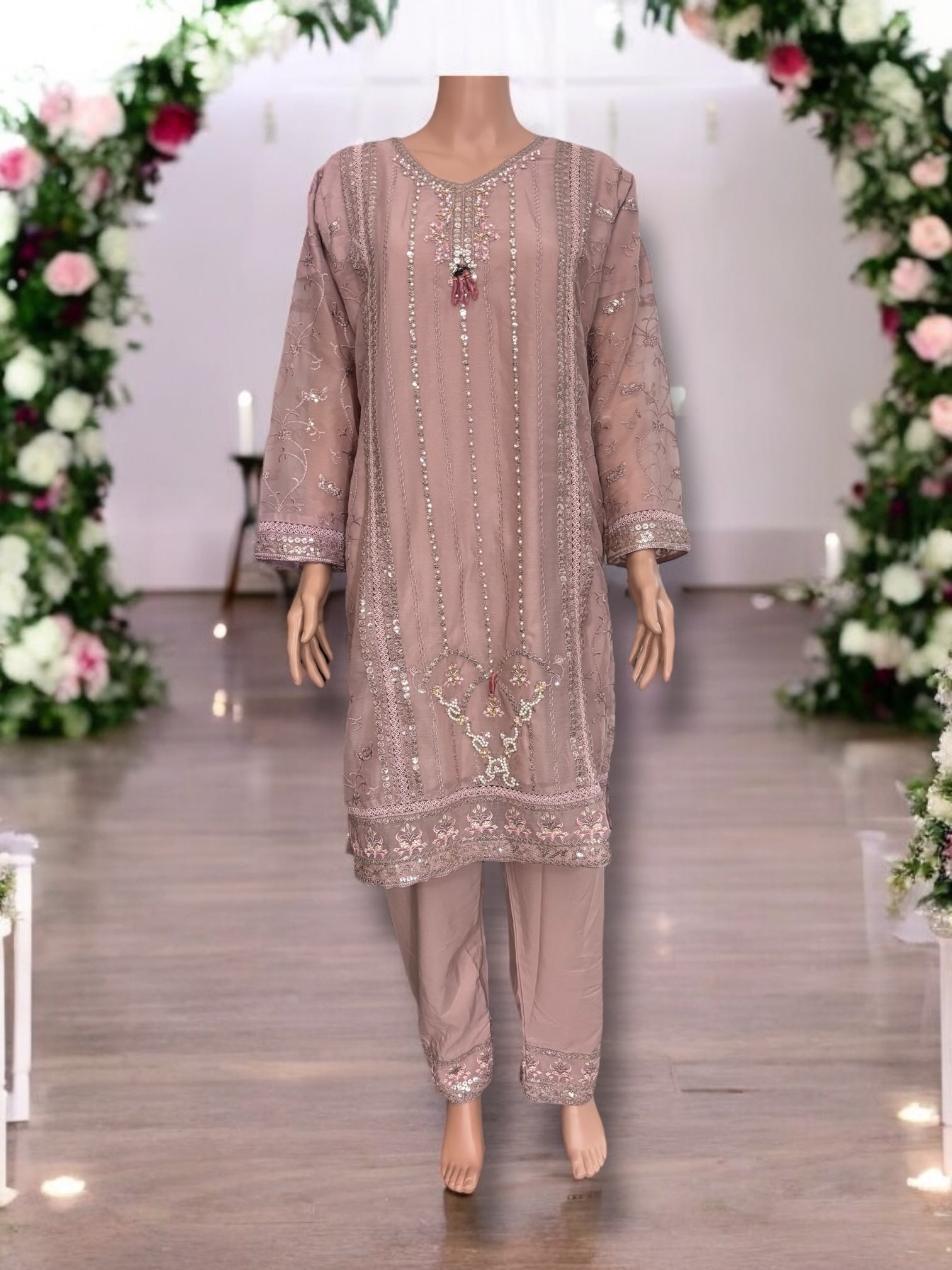 Traditional designer Salwar Kameez set by Saree Ghor Charlotte, featuring elegant ethnic wear for women in vibrant fabrics.