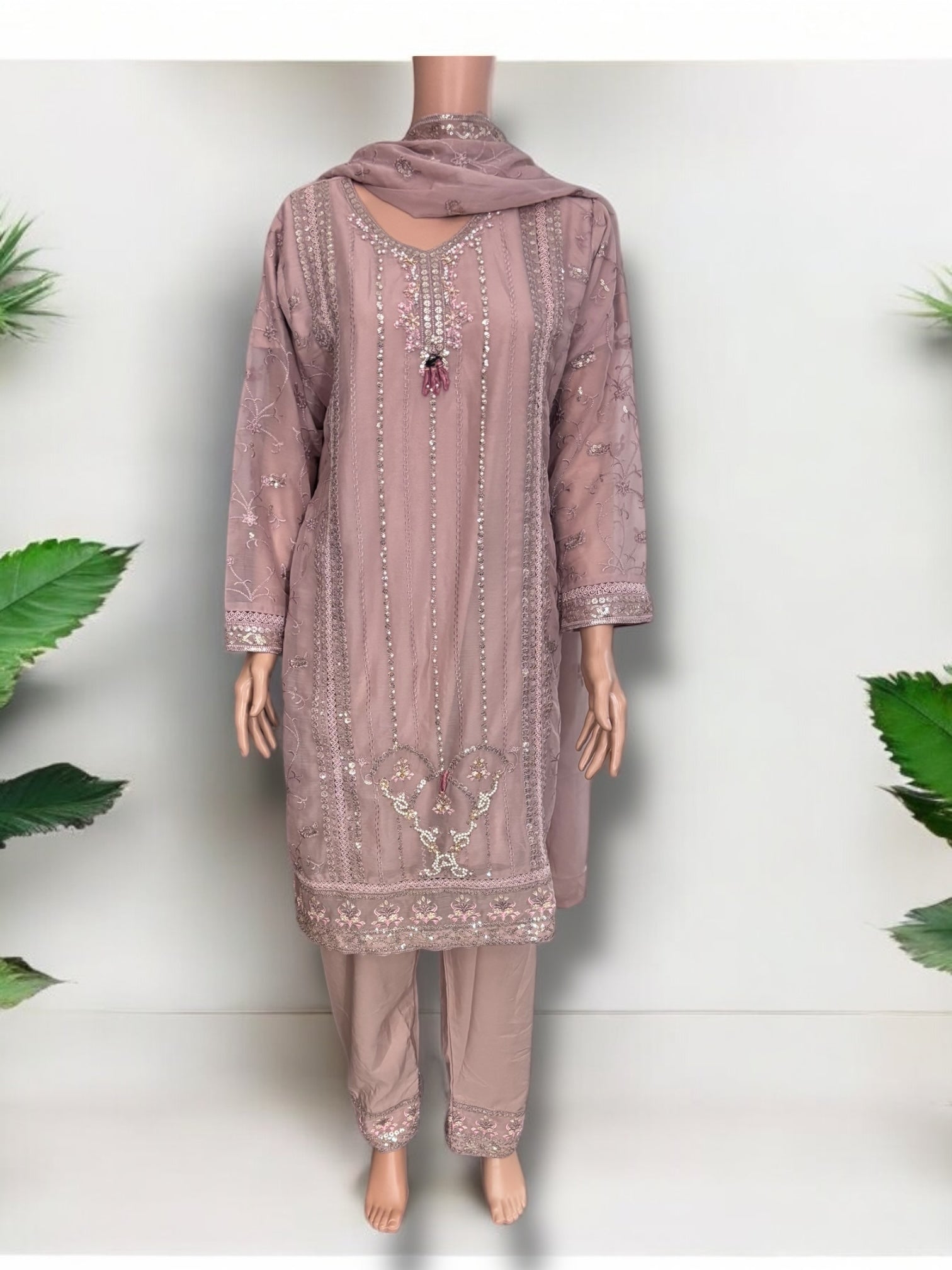 Traditional designer Salwar Kameez set by Saree Ghor Charlotte, vibrant ethnic wear for women with intricate embroidery and elegant style.