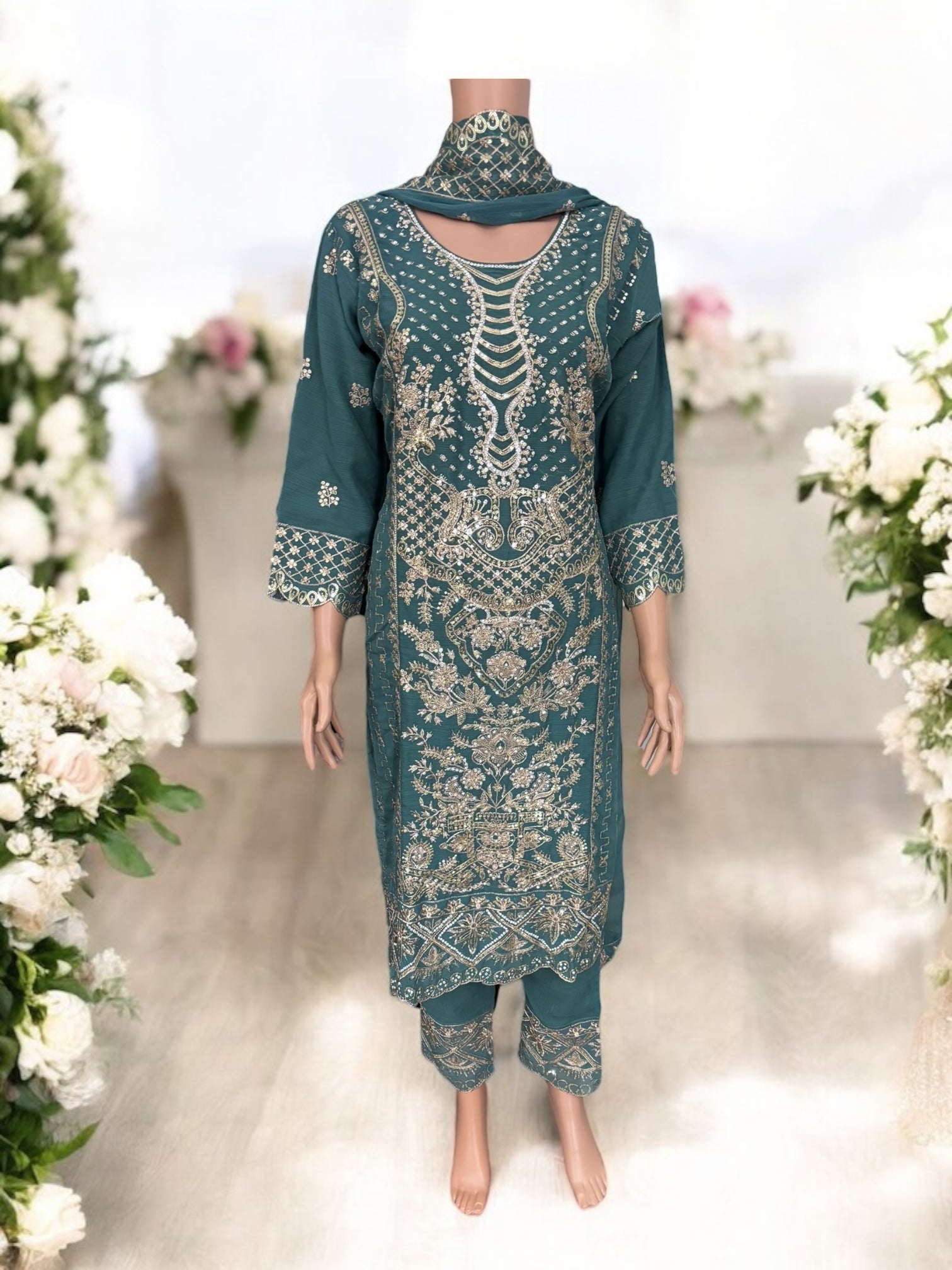 Traditional Saree Ghor Charlotte designer Salwar Kameez suit for women with intricate ethnic embroidery and vibrant fabric.