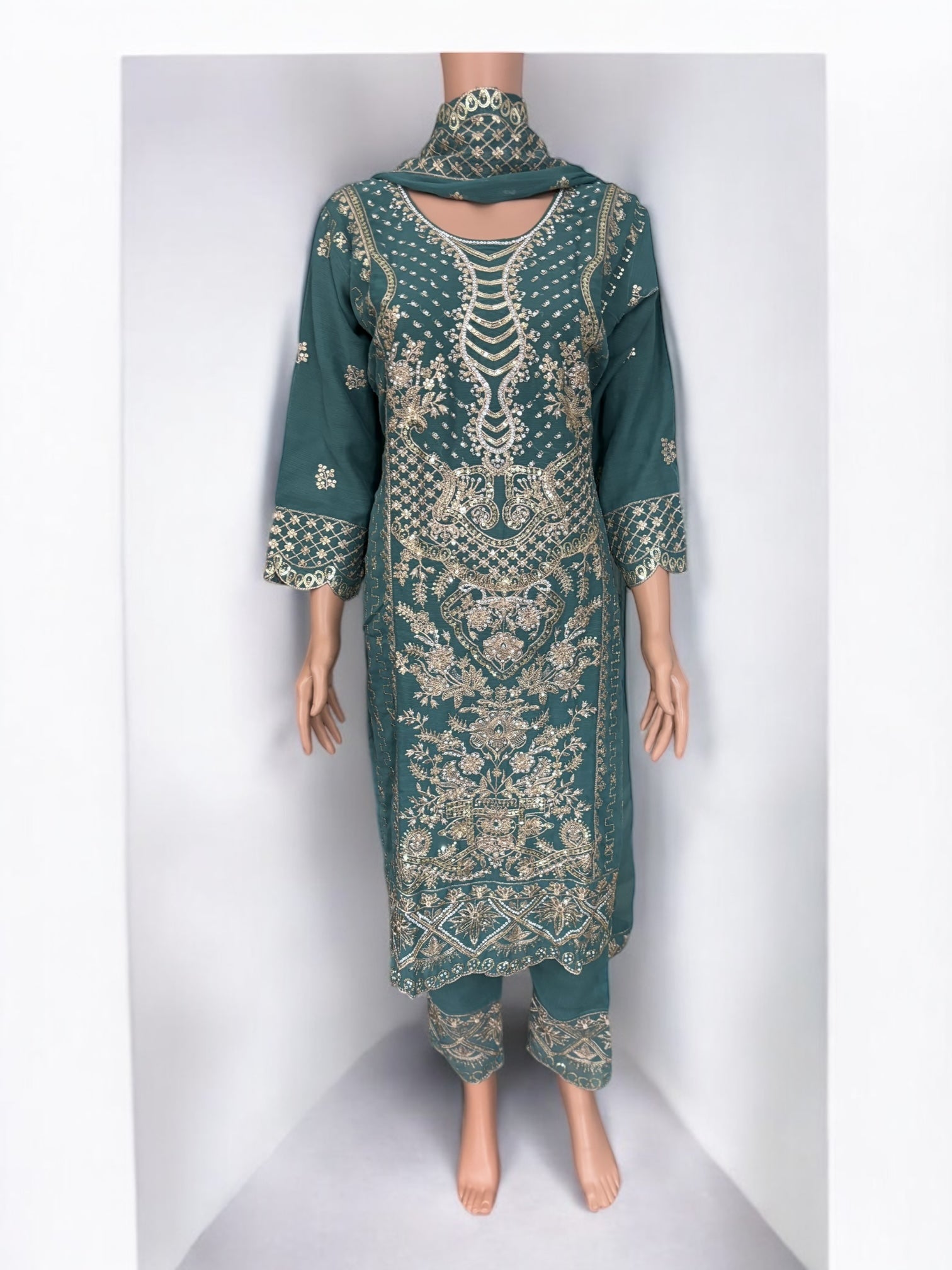 Elegant traditional designer Salwar Kameez suit by Saree Ghor Charlotte, featuring intricate ethnic embroidery for women.