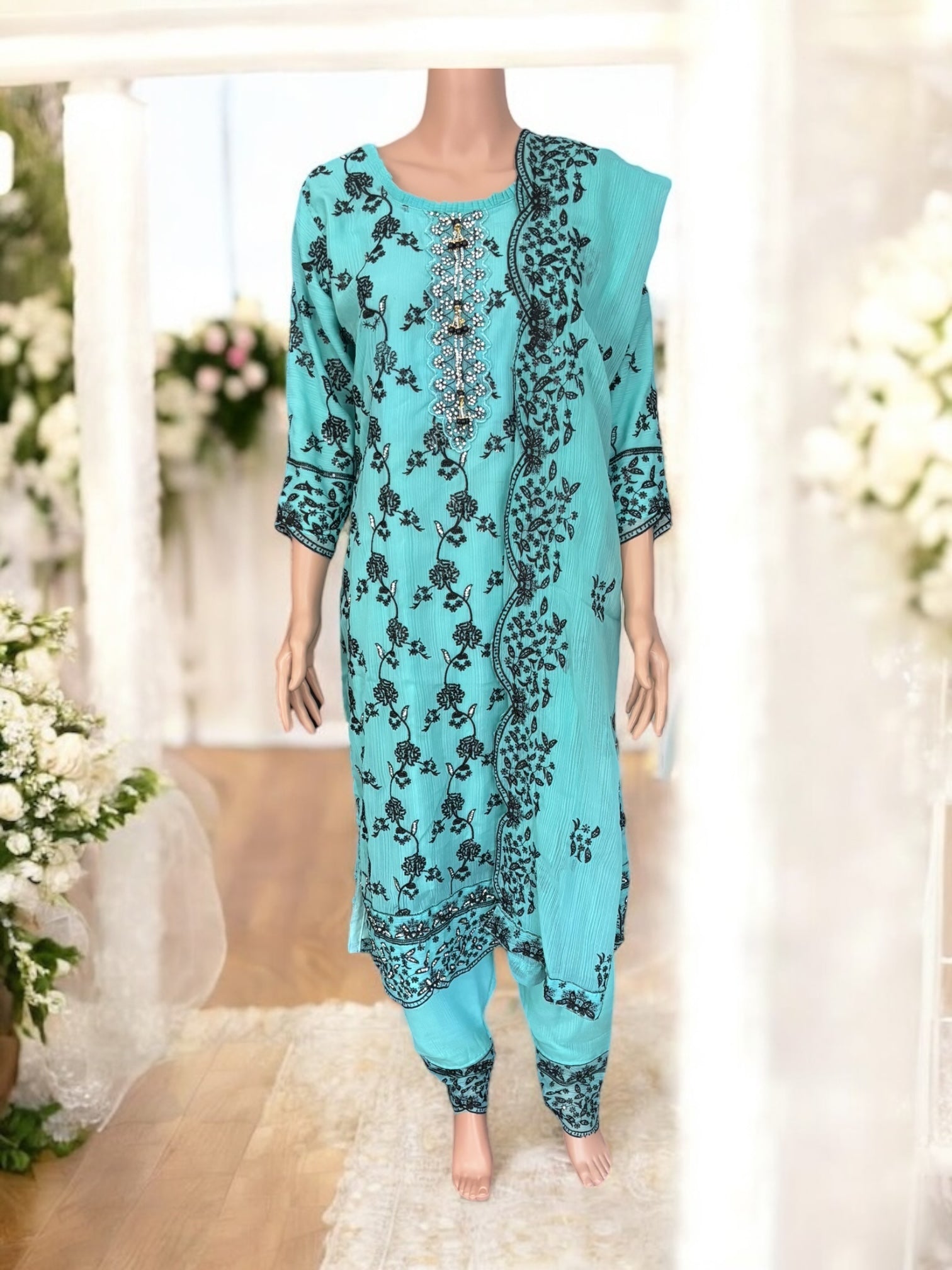Traditional designer Saree Ghor Charlotte Salwar Kameez suit, elegant ethnic wear for women with intricate patterns and vibrant colors.