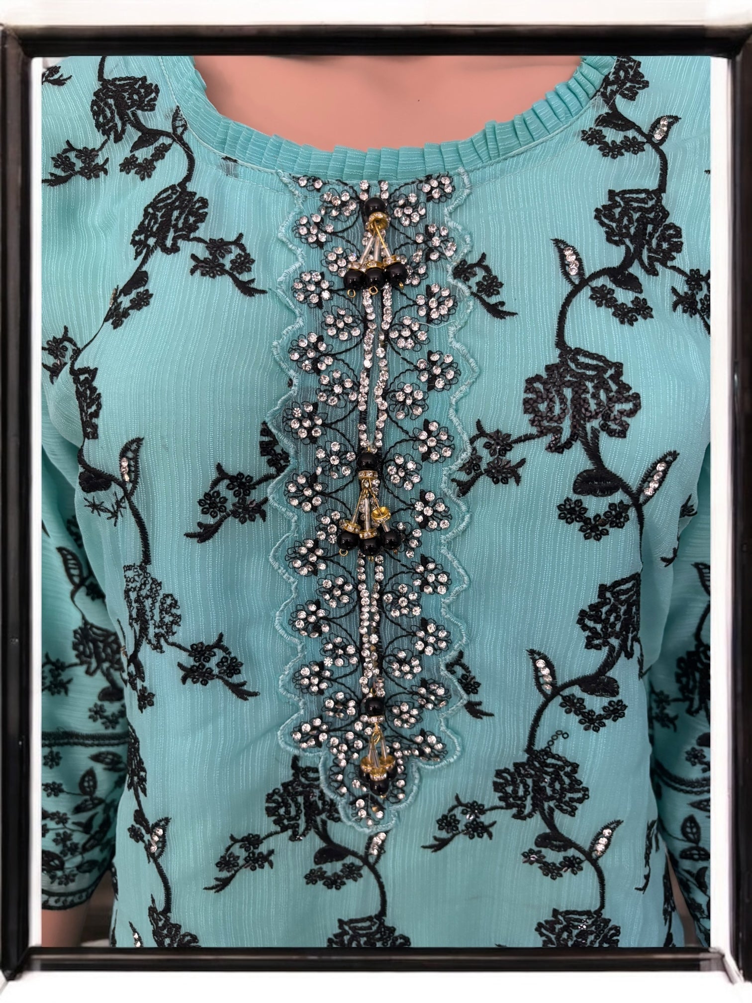 Traditional Saree Ghor Charlotte Salwar Kameez suit for women, showcasing intricate embroidery and vibrant ethnic design.
