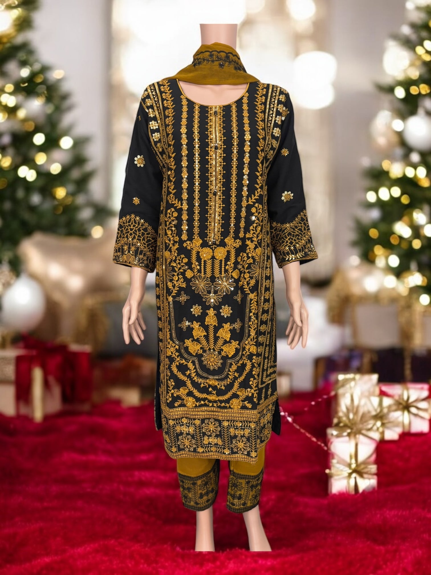 Traditional designer Salwar Kameez suit by Saree Ghor Charlotte, featuring intricate ethnic embroidery for women.