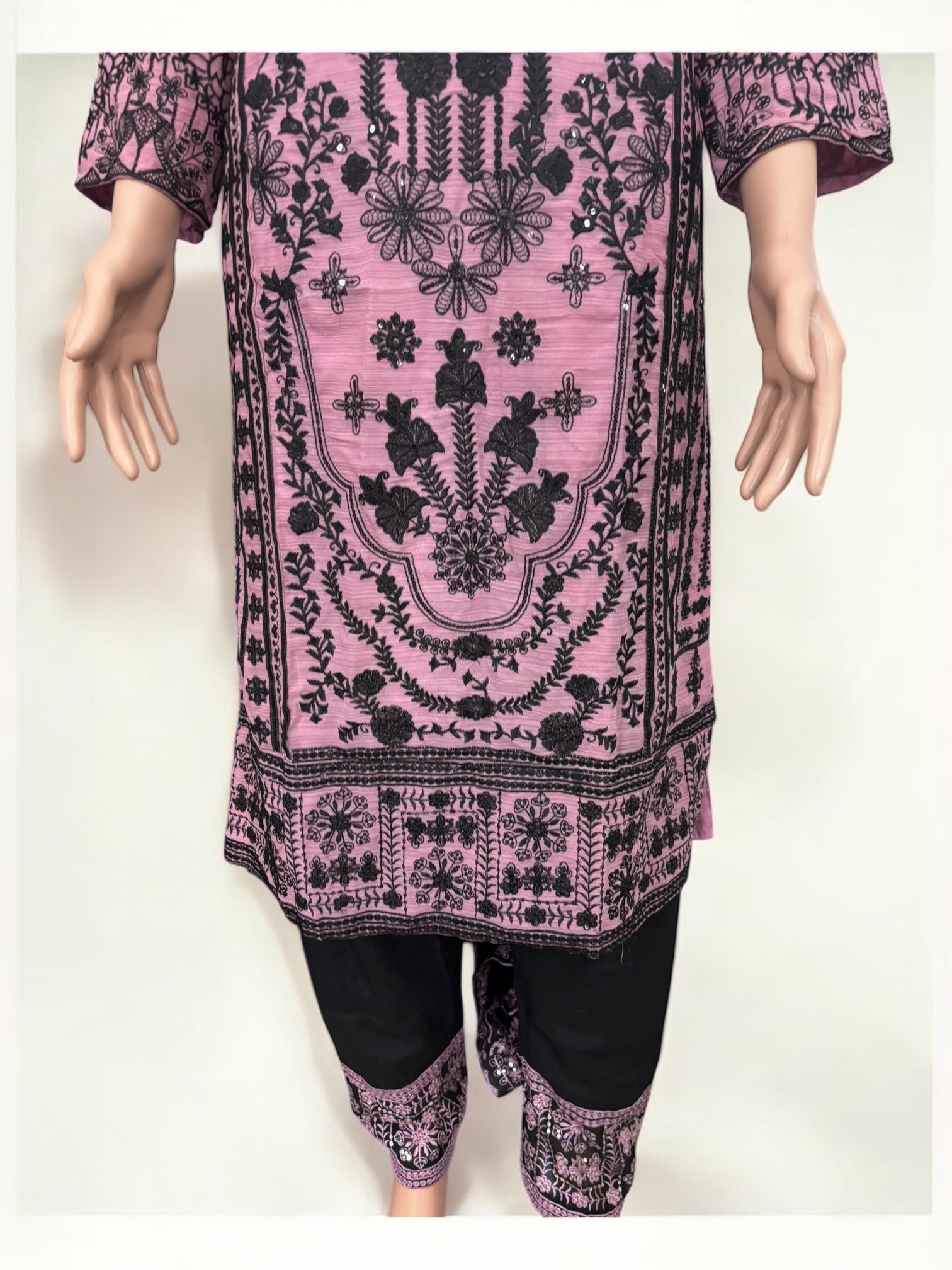 Traditional designer Salwar Kameez suit by Saree Ghor Charlotte, elegant ethnic wear for women with intricate details.
