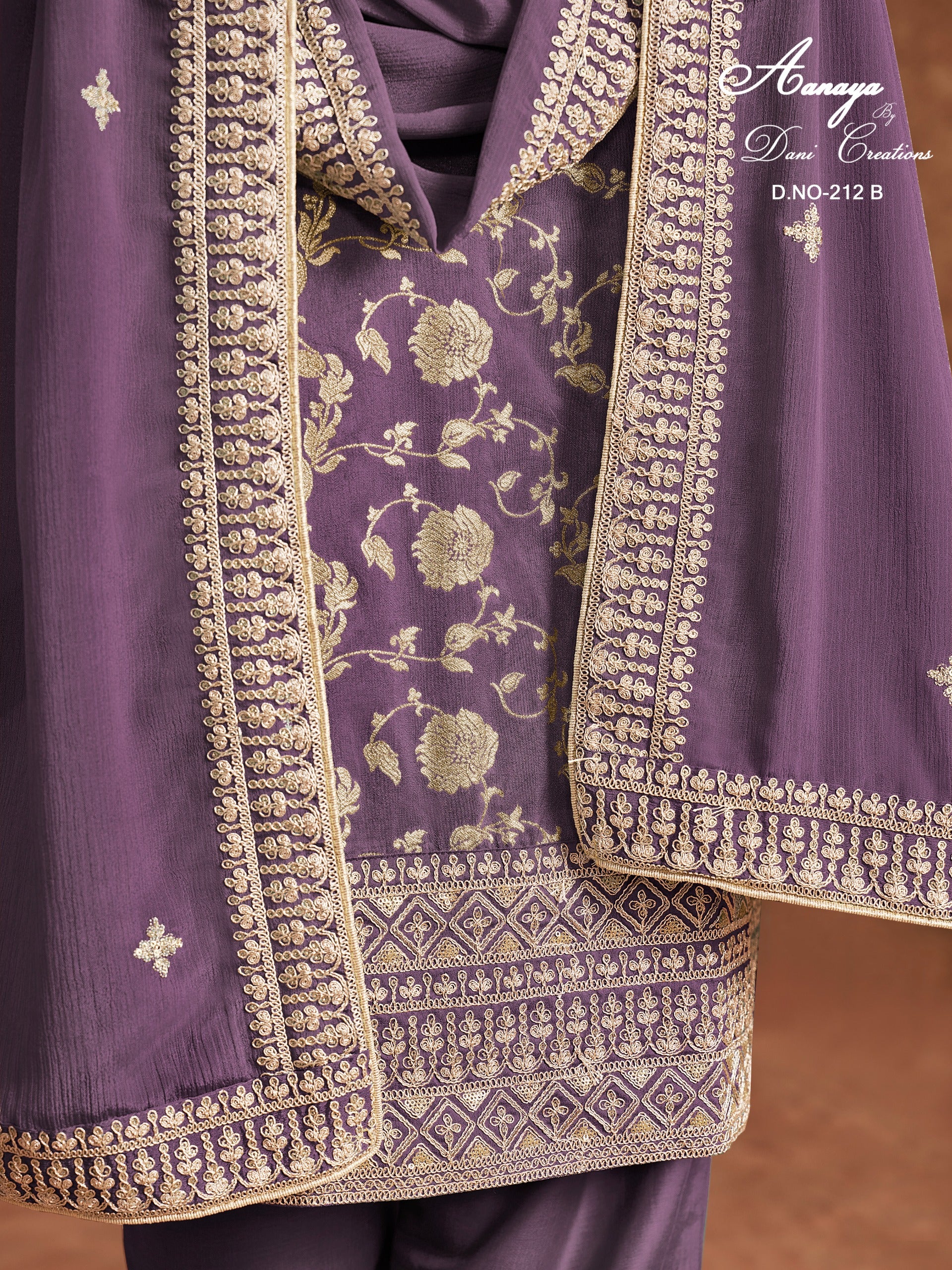 Traditional designer Salwar Kameez suit by Saree Ghor Charlotte, vibrant ethnic wear for women with intricate patterns.