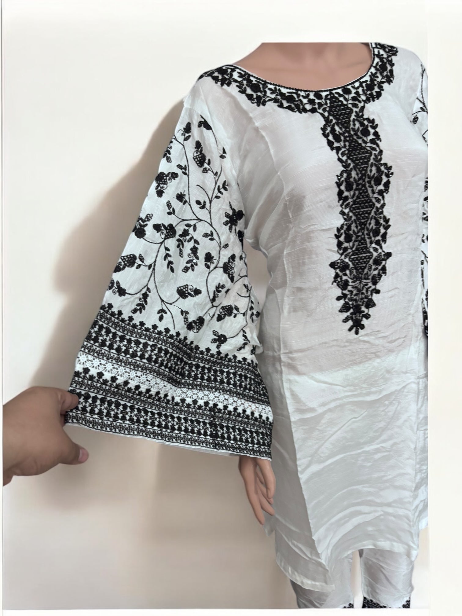 Traditional designer Salwar Kameez suit by Saree Ghor Charlotte, women's ethnic wear with intricate fabric and elegant design.
