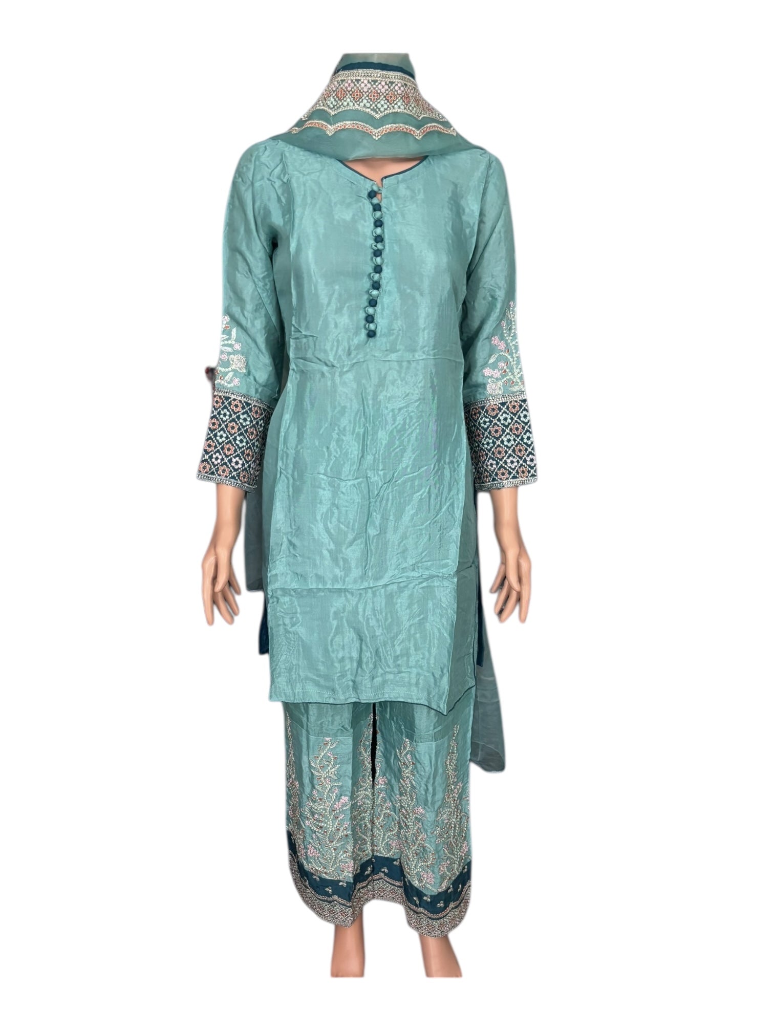 Traditional designer Salwar Kameez suit by Saree Ghor Charlotte, ethnic wear for women, showcasing intricate fabric and elegant style.