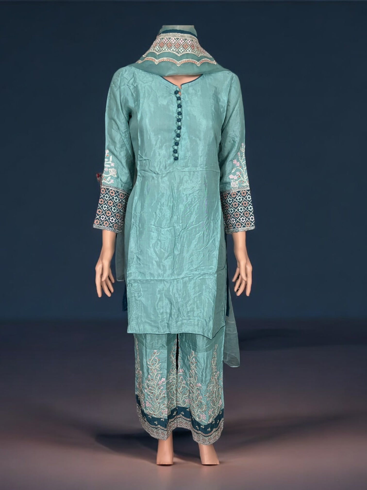 Traditional designer Salwar Kameez suit by Saree Ghor Charlotte featuring elegant ethnic wear for women.
