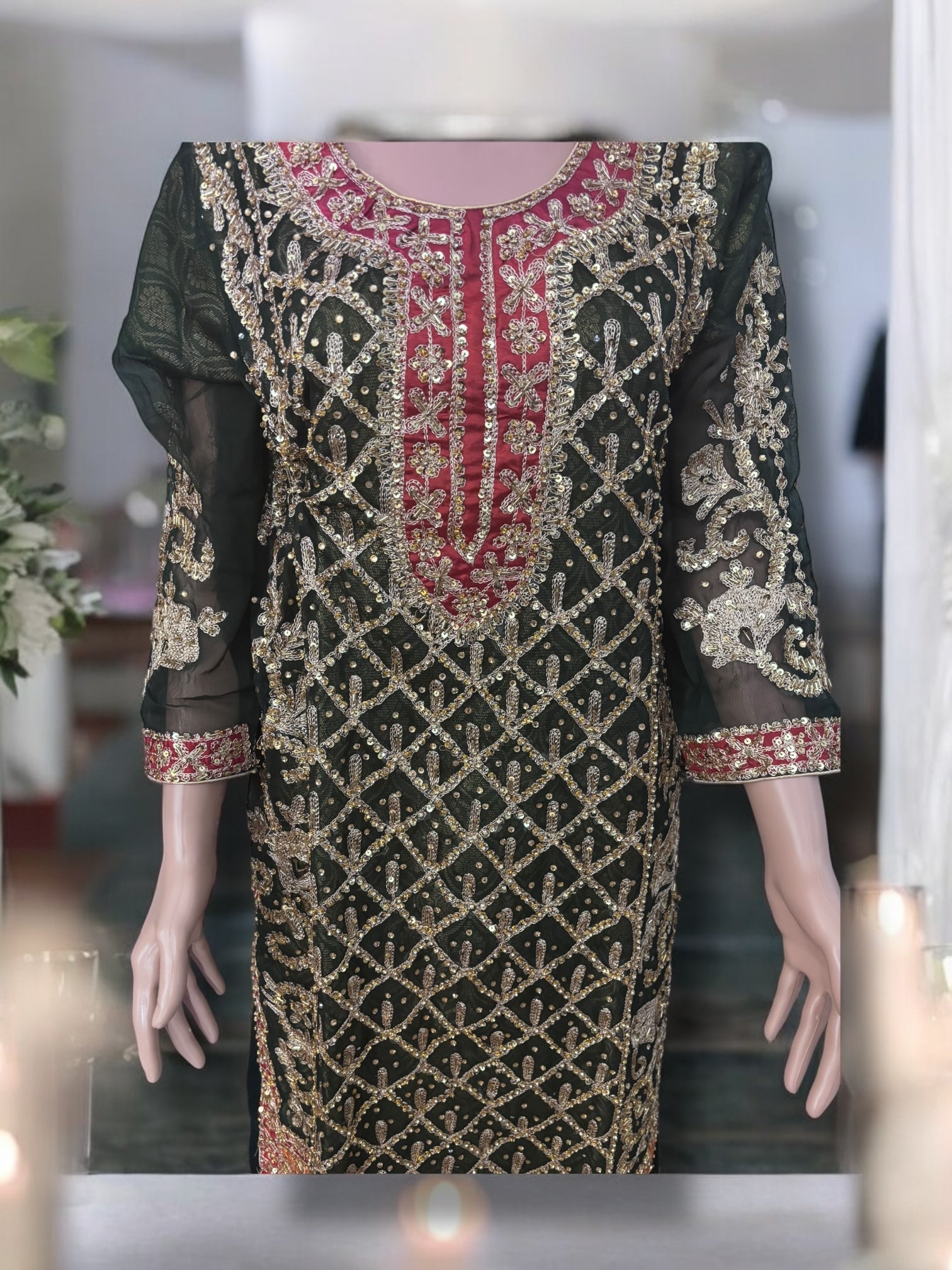 Traditional designer Sharara Salwar Kameez set by Saree Ghor Charlotte, elegant ethnic wear for women with intricate details.