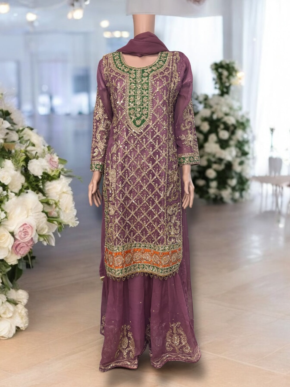 Traditional designer Sharara Salwar Kameez set by Saree Ghor Charlotte, women's ethnic wear with intricate embroidery and vibrant colors.